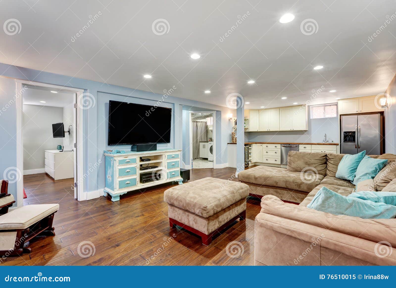 Pastel Blue Walls In Basement Living Room Interior Stock Photo