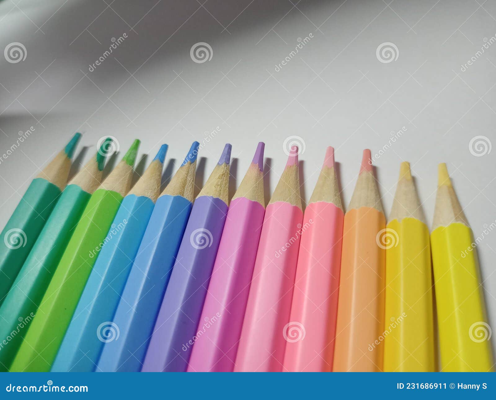 12 pastel color pencils stock image. Image of orange 231686911