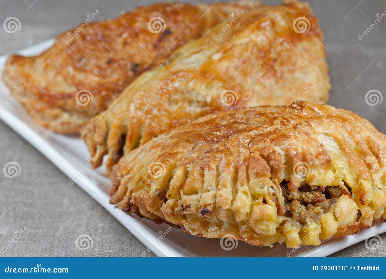 Pasties Filled with Minced Meat on a White Plate W Stock Image Image