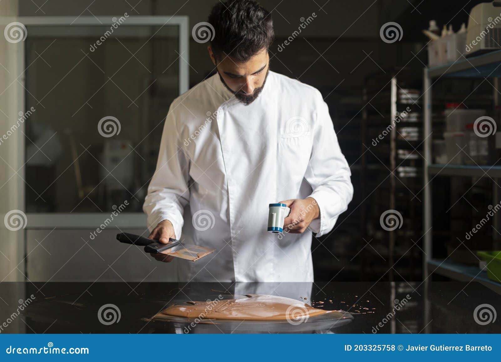 https://thumbs.dreamstime.com/z/pastry-chef-measuring-temperature-chocolate-infrared-thermometer-working-tempering-portrait-203325758.jpg