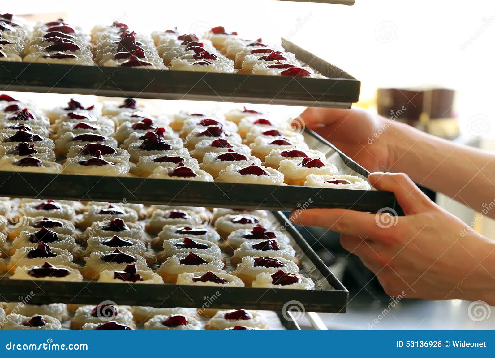 Pastry Chef Puts Cakes in the Bakery Stock Photo Image of