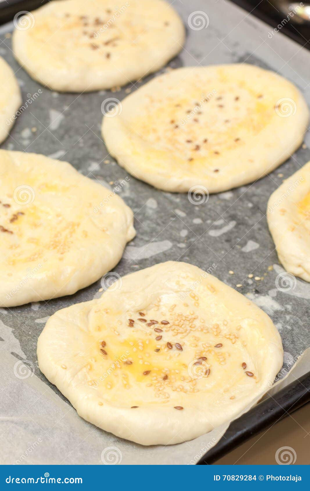 Pastry with Sesame Seeds Ready for Baking in the Oven Stock Photo