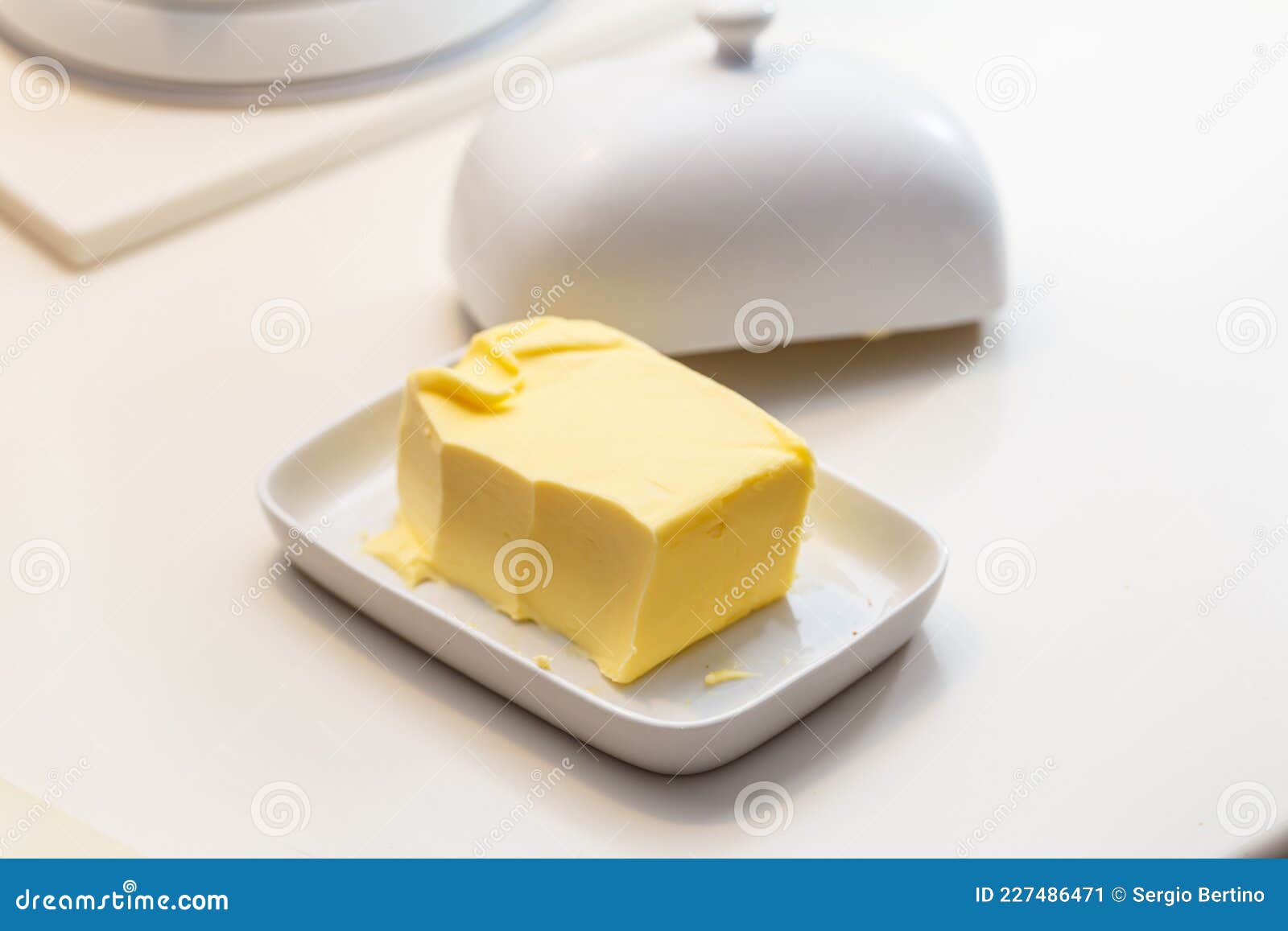 Pat of Farm Butter in a Ceramic Butter Dish Stock Image Image of