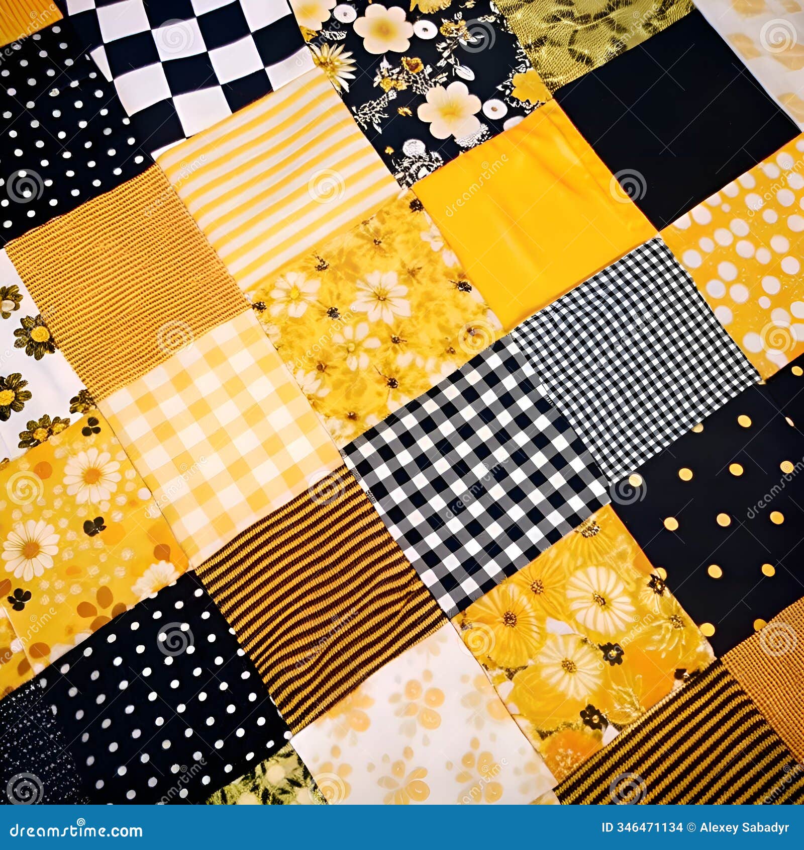 patchwork quilt with black, yellow, and white patterns