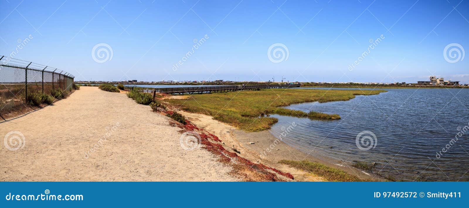 path along the peaceful and tranquil marsh of bolsa chica wetlands