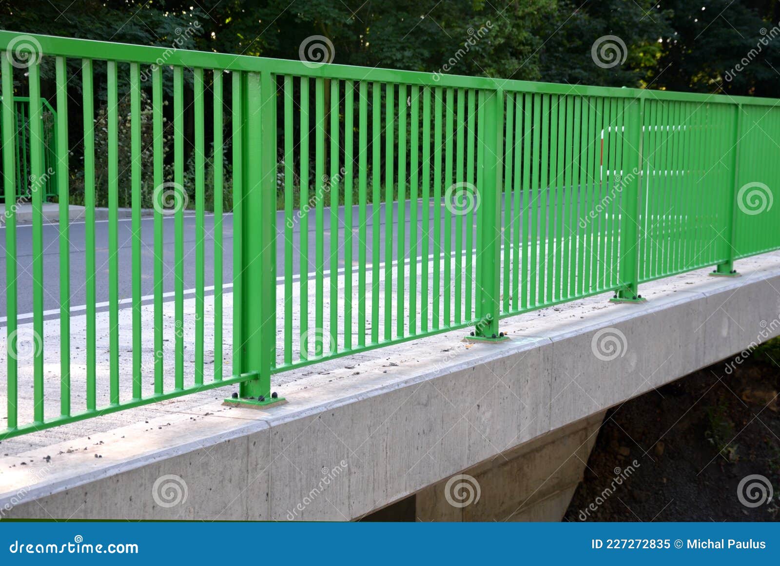 Path for Cyclists with an Asphalt Surface. Galvanized Iron Railing Over ...