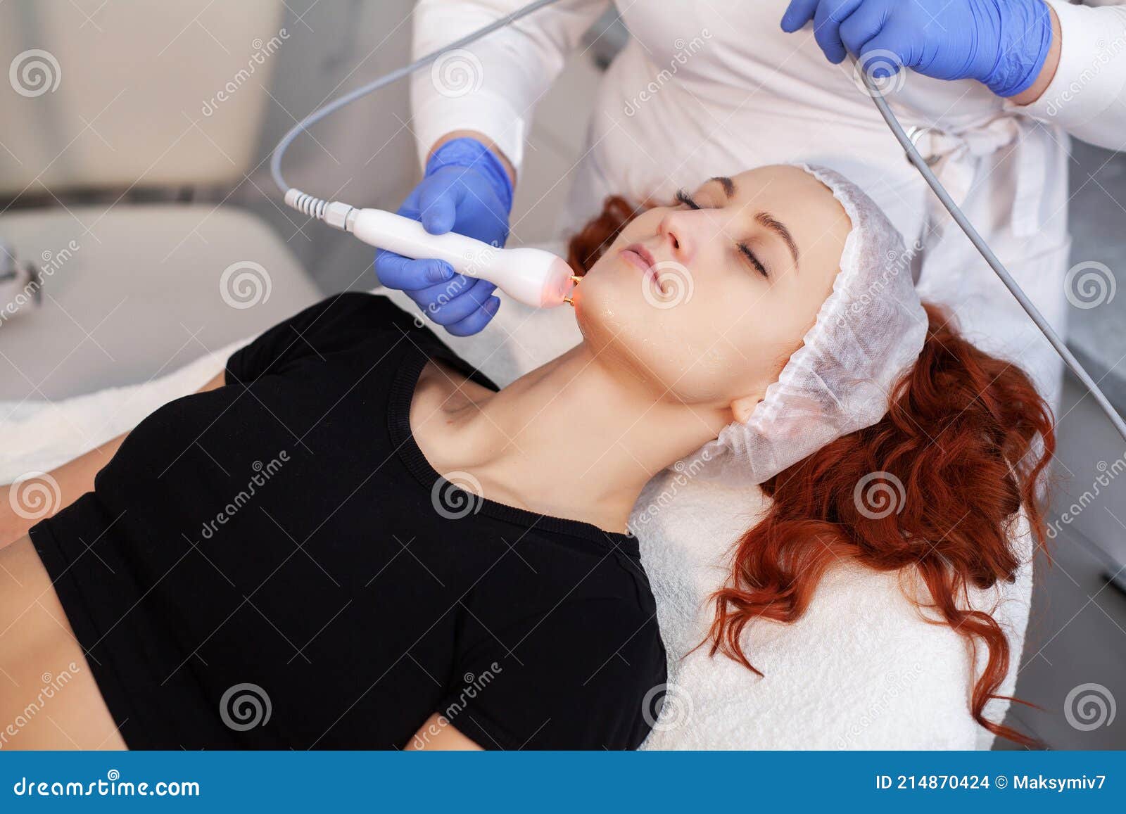 Patient Applying Electrical Stimulation Therapy On Knee Joint. T Stock