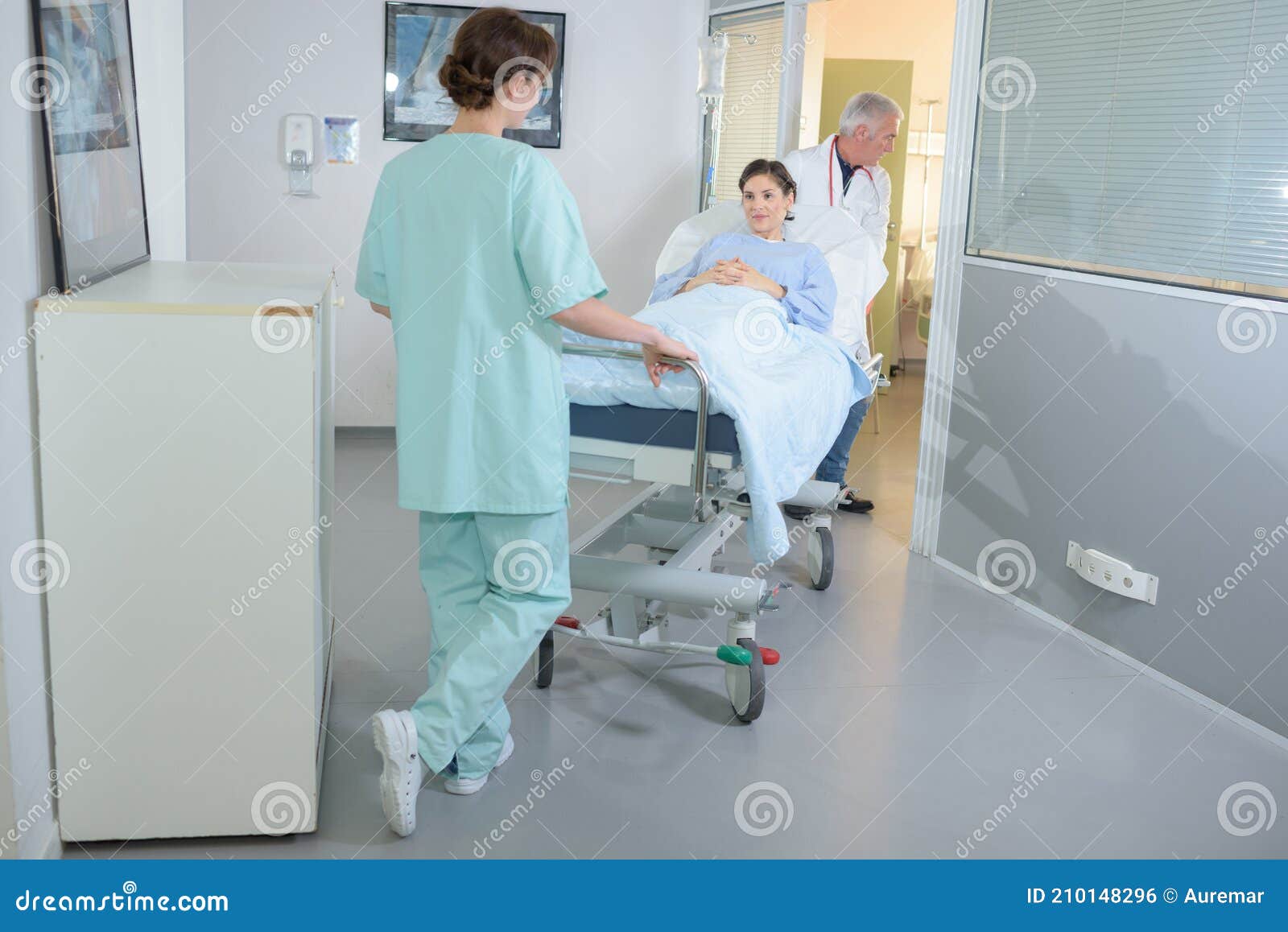 patient being wheeled on hospital stretcher