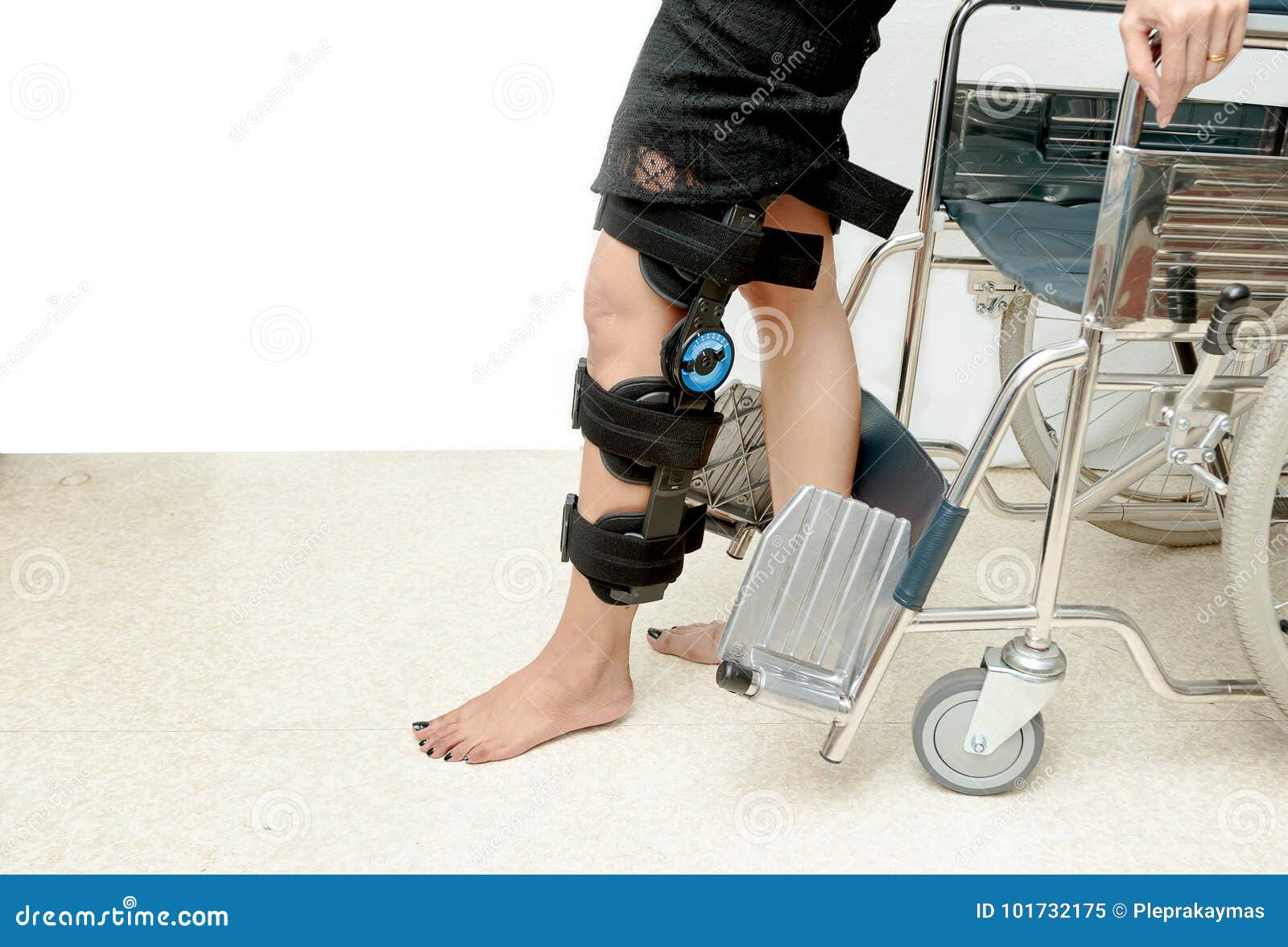 patient on knee brace support try to walk training,rehabilitation treatment