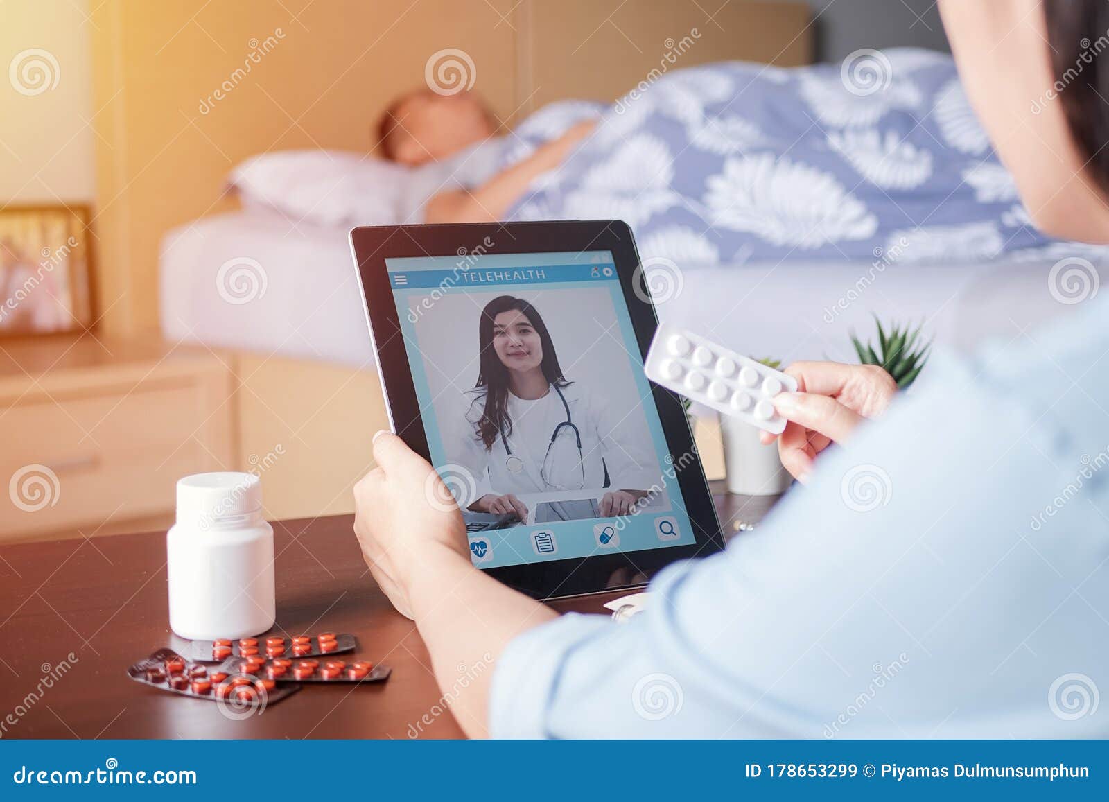 patient`s relatives use video conference, make online consultation with doctor on mobile application, ask doctor about illness