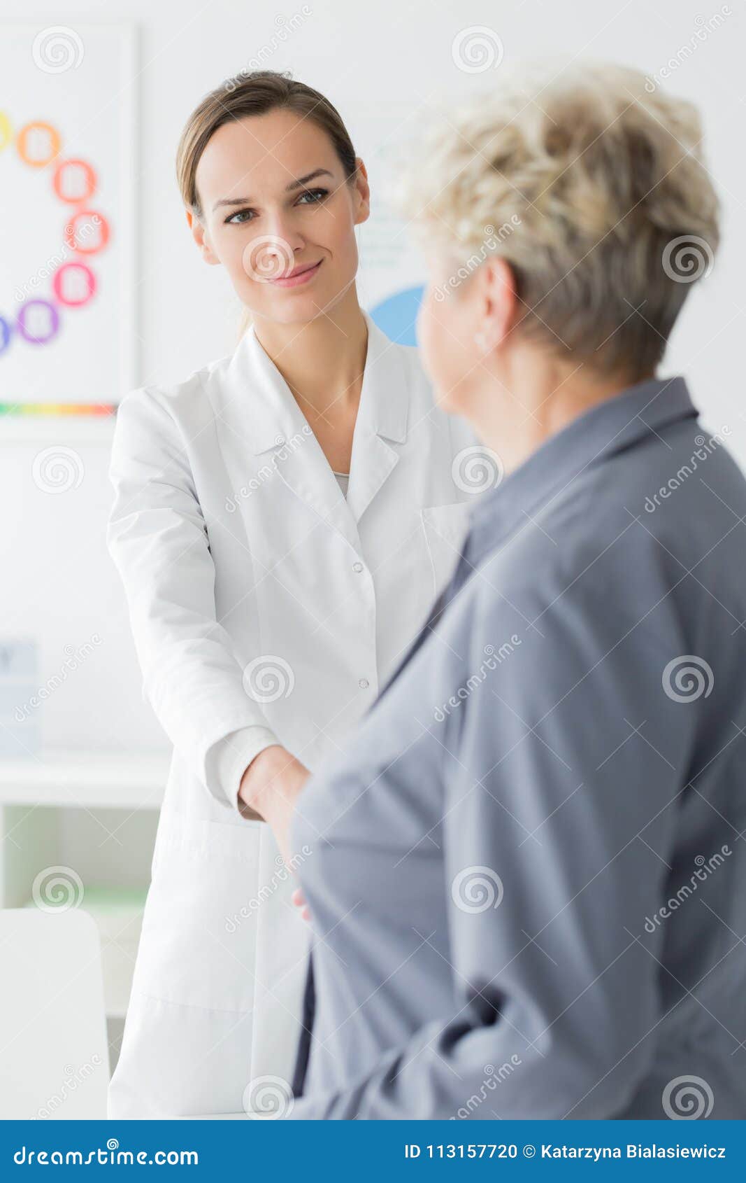 patient thanking smiling dietician