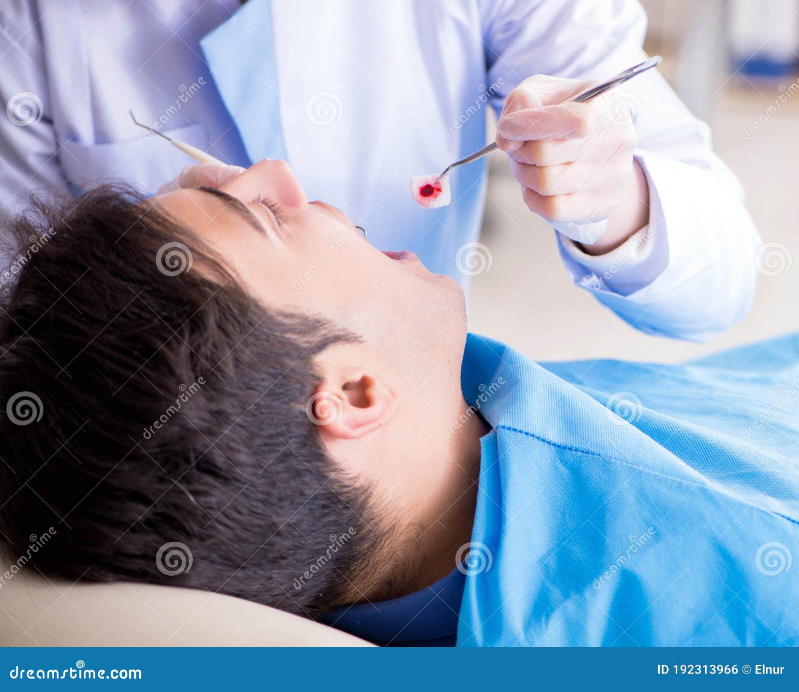 Patient Visiting Dentist for Regular Checkup and Filling Stock Photo