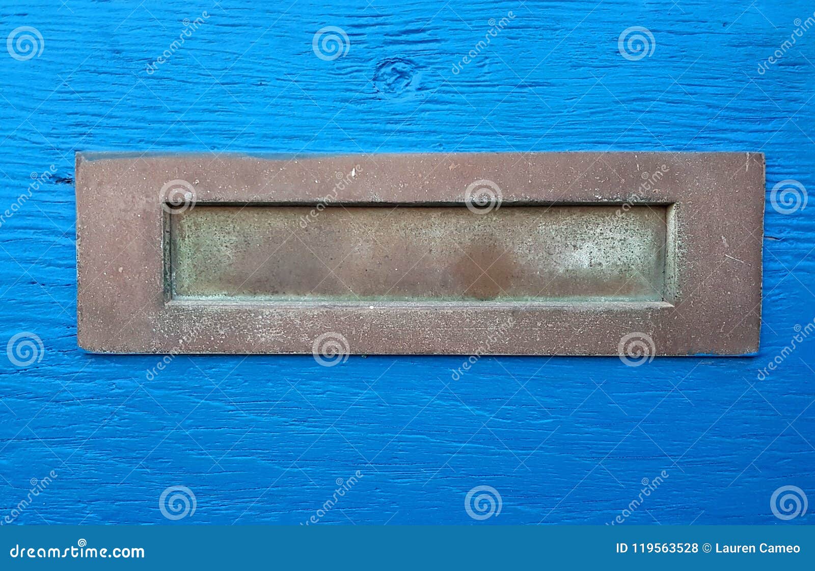 Patina Brass Mail Slot In Distressed Blue Wooden Door Stock Photo