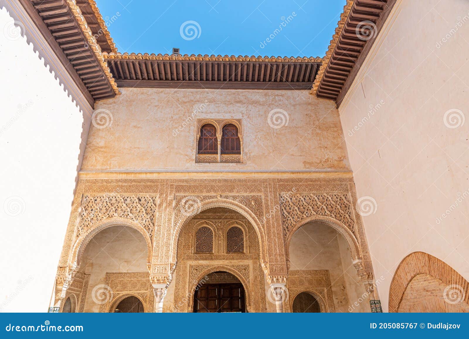 patio del cuarto dorado inside of alhambra palace in granada, spain