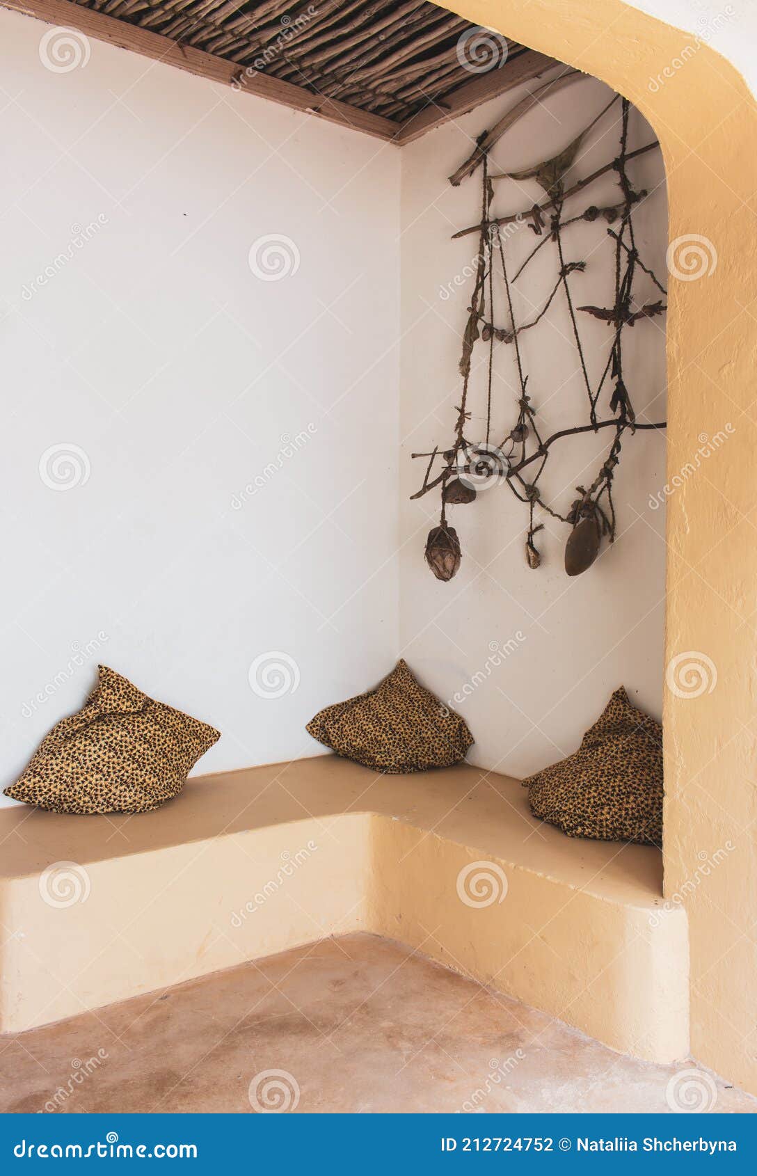 patio in eco hotel. backyard with pillows and rural decoration. eco tourism concept. summer vacations. lounge zone in hotel.