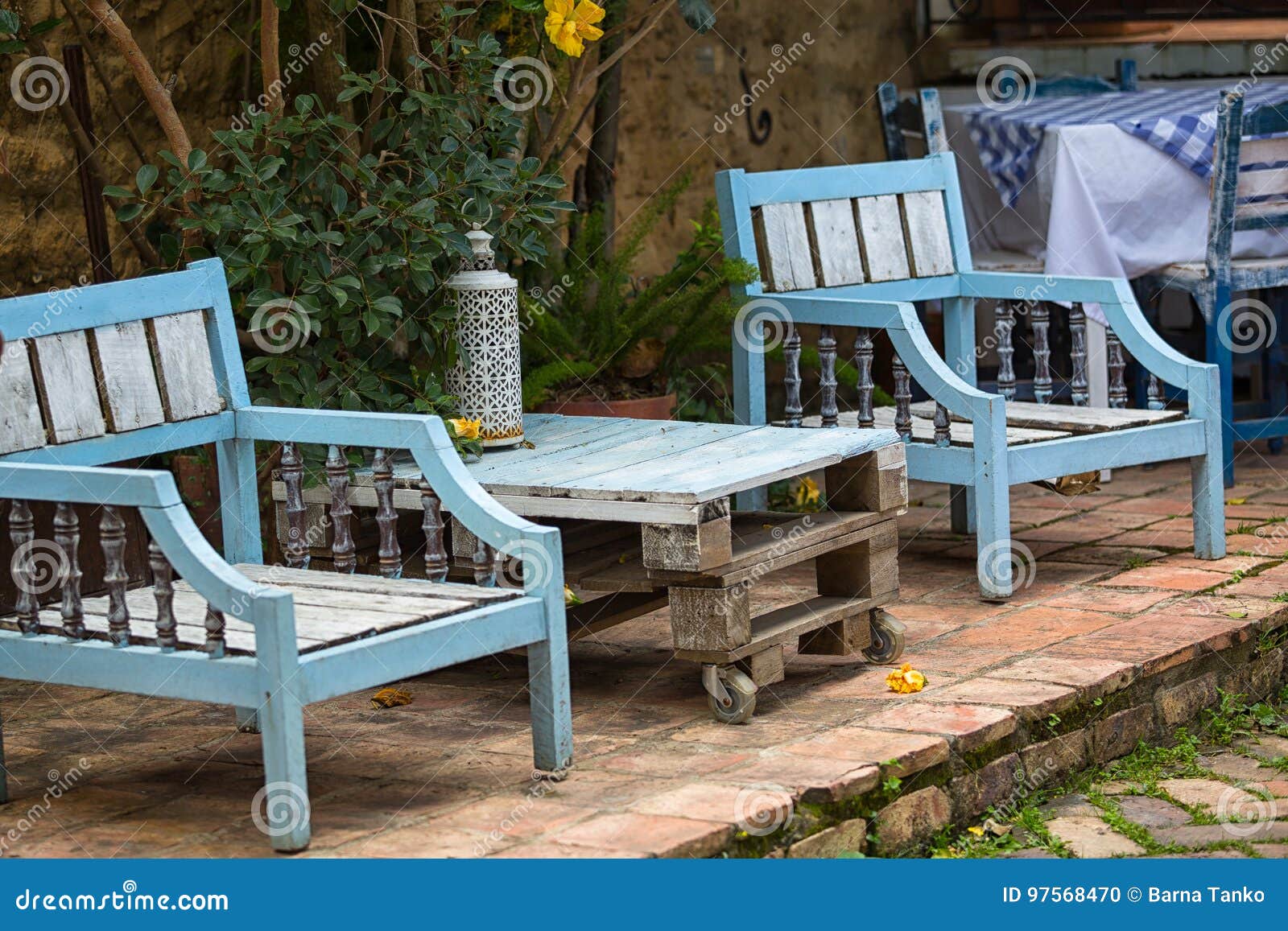 Patio Furniture Made Using Reclaimed Wood In Colombia Stock Photo