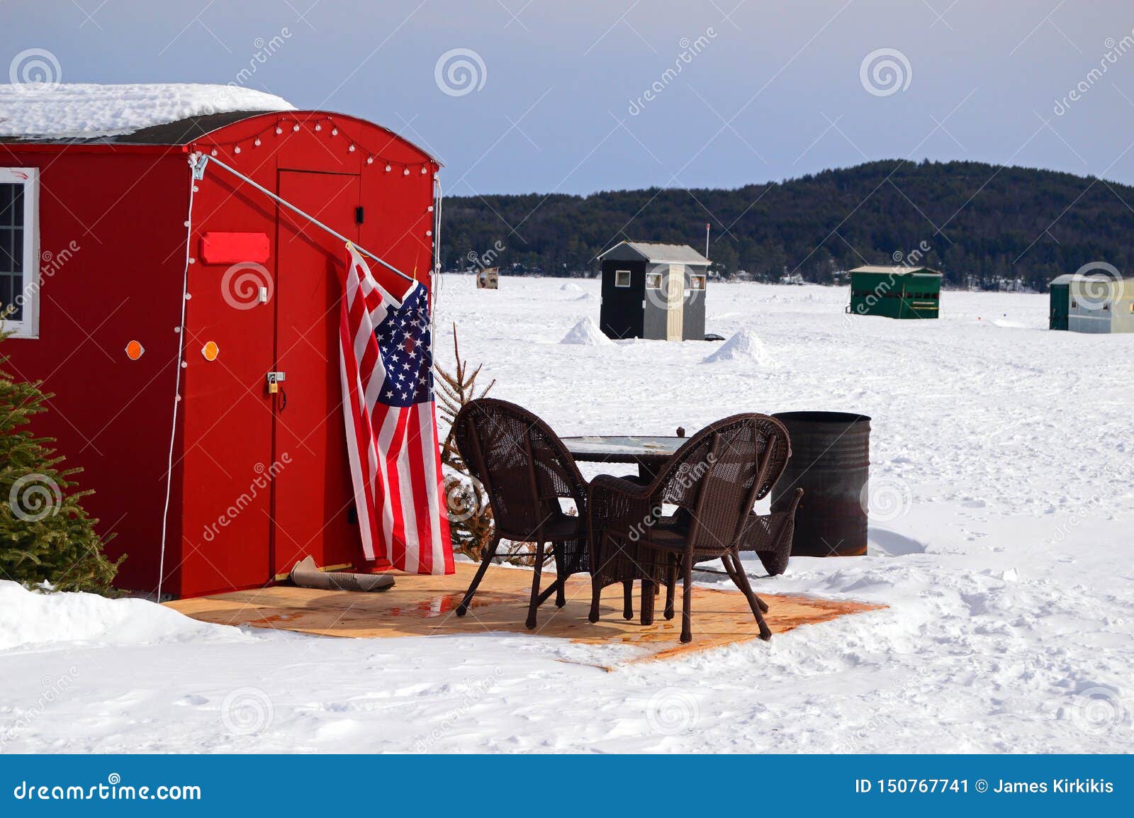 Patio Furniture Outside An Ice Fishing Shack On A Frozen Lake