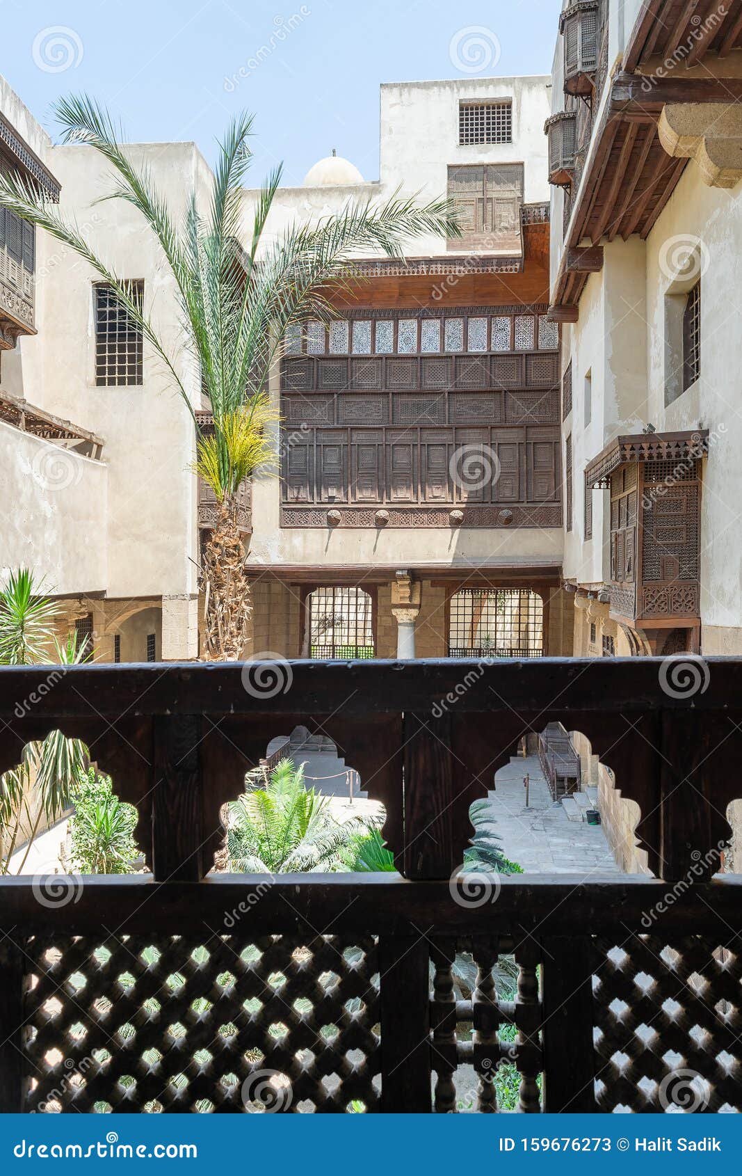 patio of ottoman era beit el sehemy historic building framed by wooden balustrade, cairo, egypt