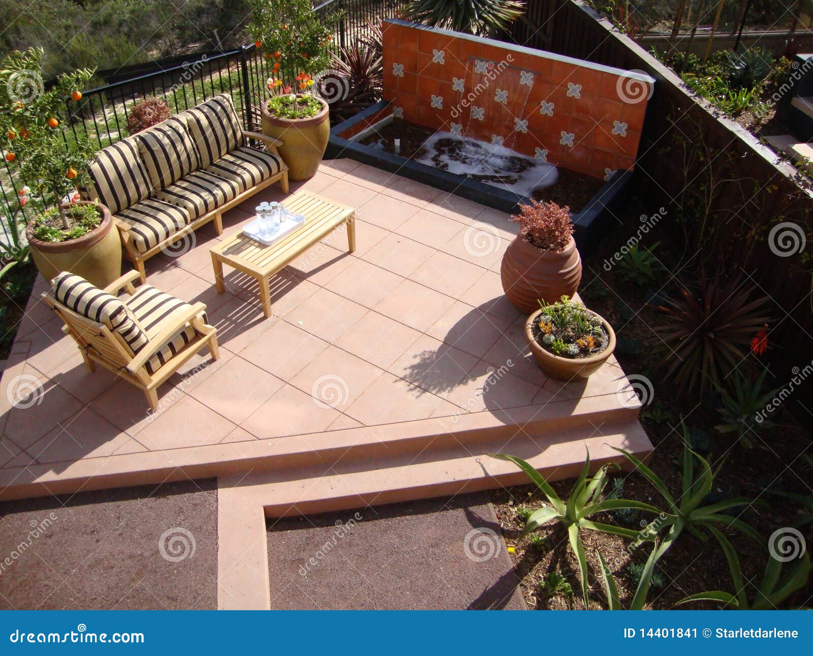 patio with a water fountain