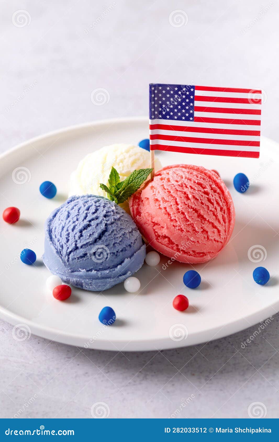 Patriotic Colors Ice Cream Scoops with American Flag on White Plate ...