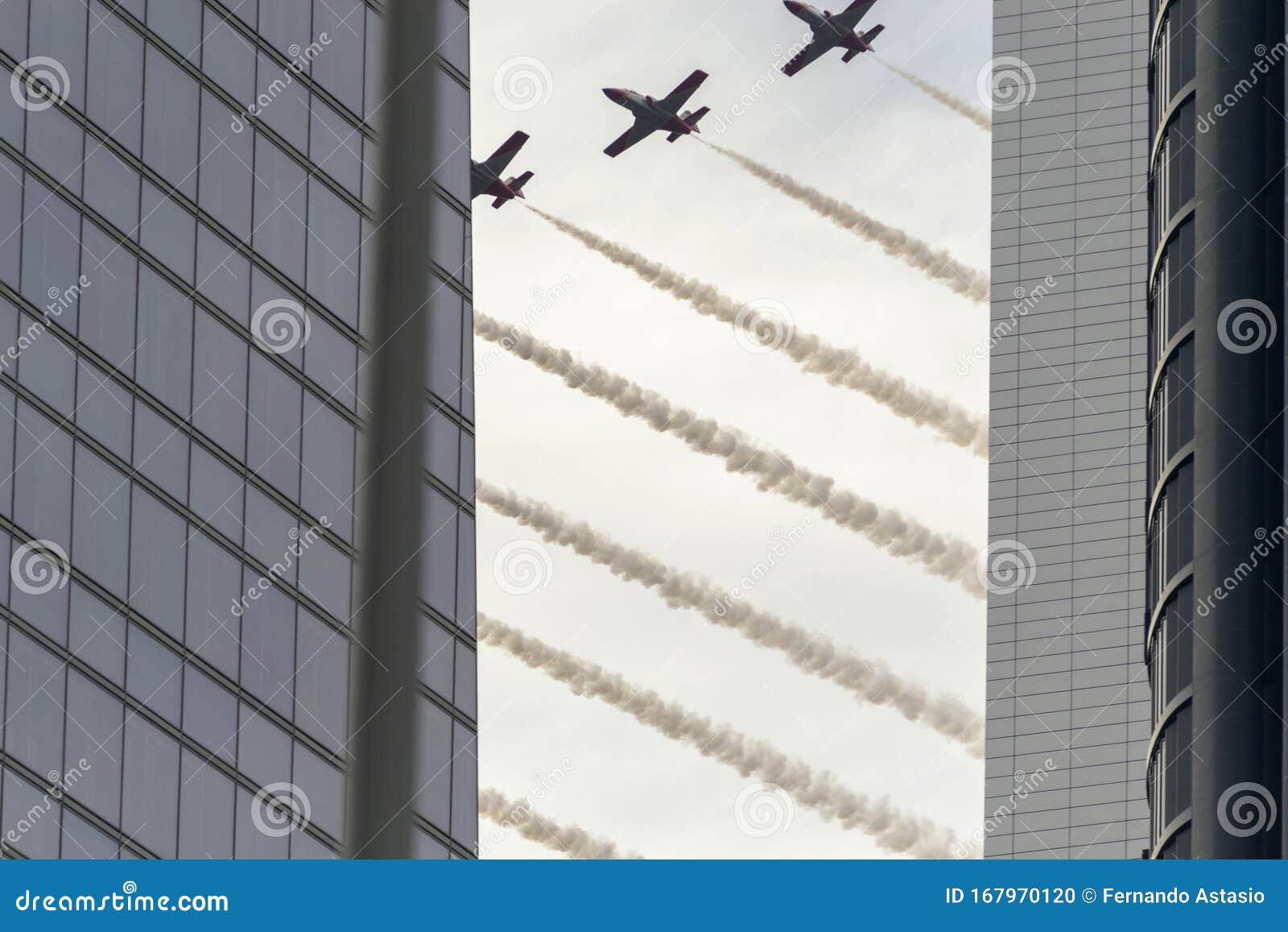 patrol eagle behind the skyscrapers of madrid