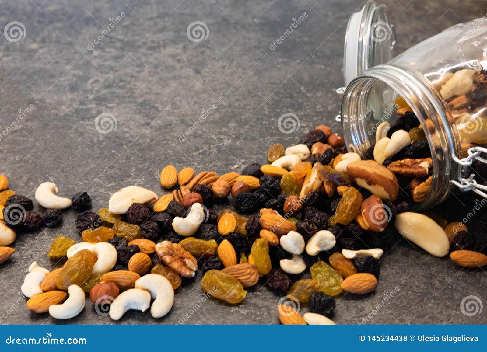 Pattern of Nuts in Circle Form. Various Nuts on Dark Background. Pecan, Macadamia, Brazil Nut