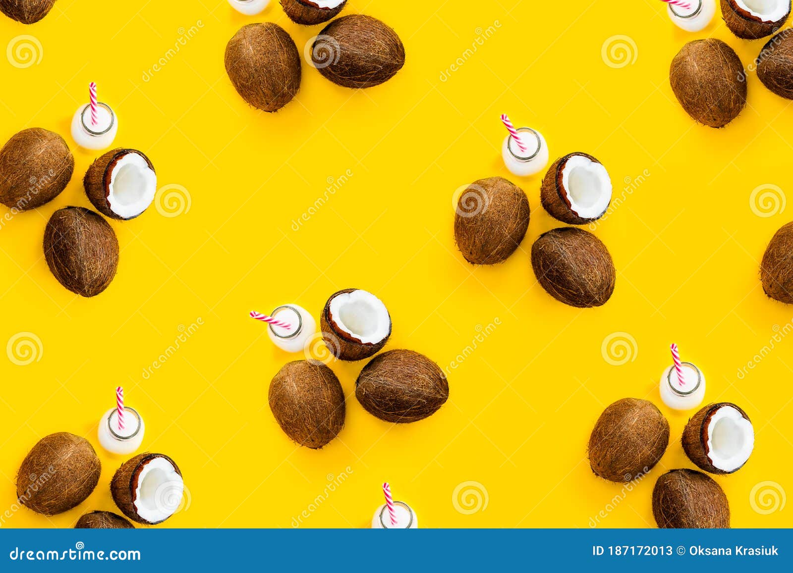 pattern with ripe coconuts and bottle with drink on yellow background. top view. creative summer concept. exotic and