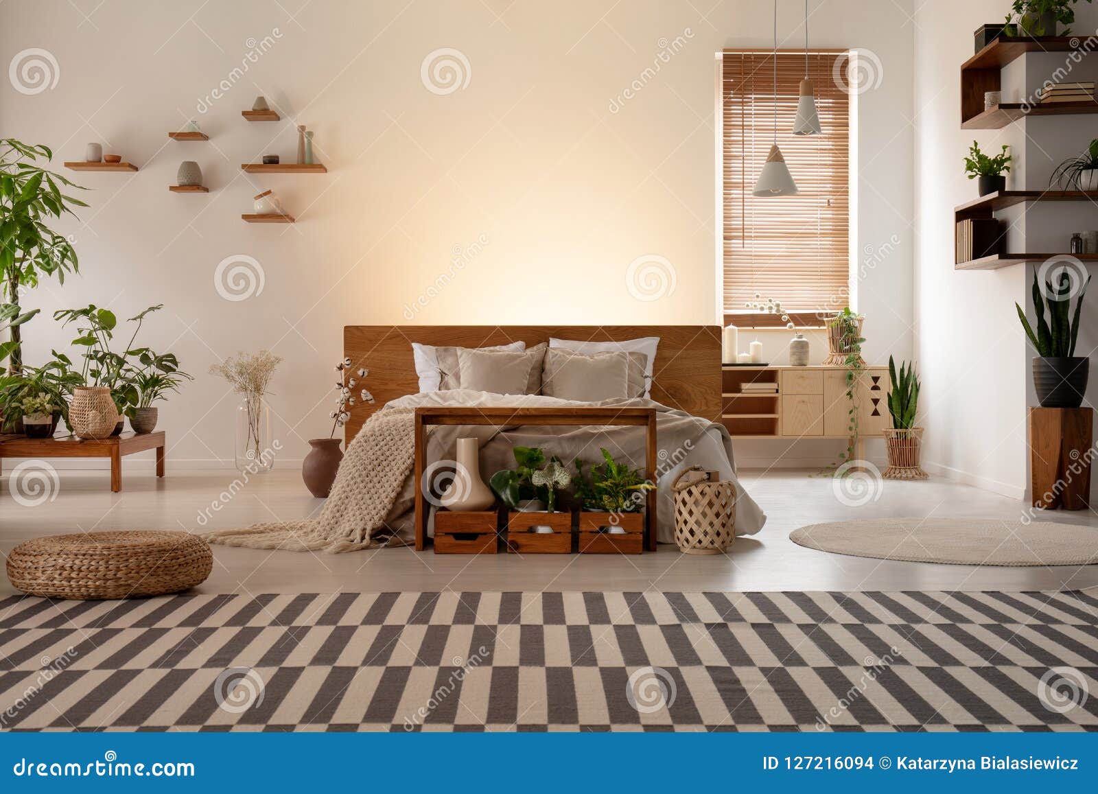 Patterned Carpet in Front of Bed in Botanic Bedroom Interior with
