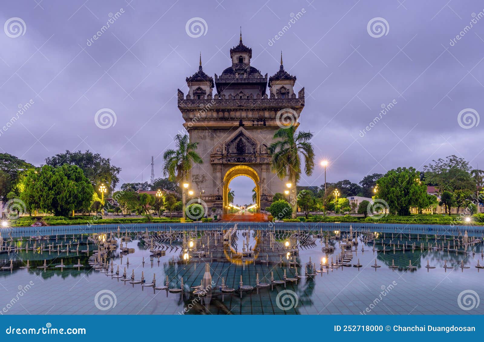 patuxai literally meaning victory gate and sunset in vientiane,laos