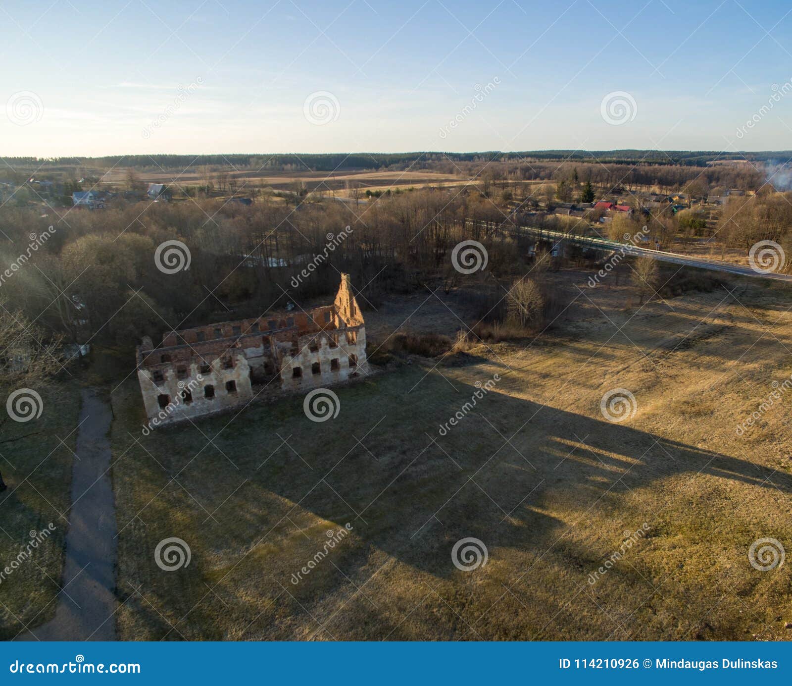 paulavos republic in lithuania. old bricks ruins with forest in background. sightseeing object in lithuania.