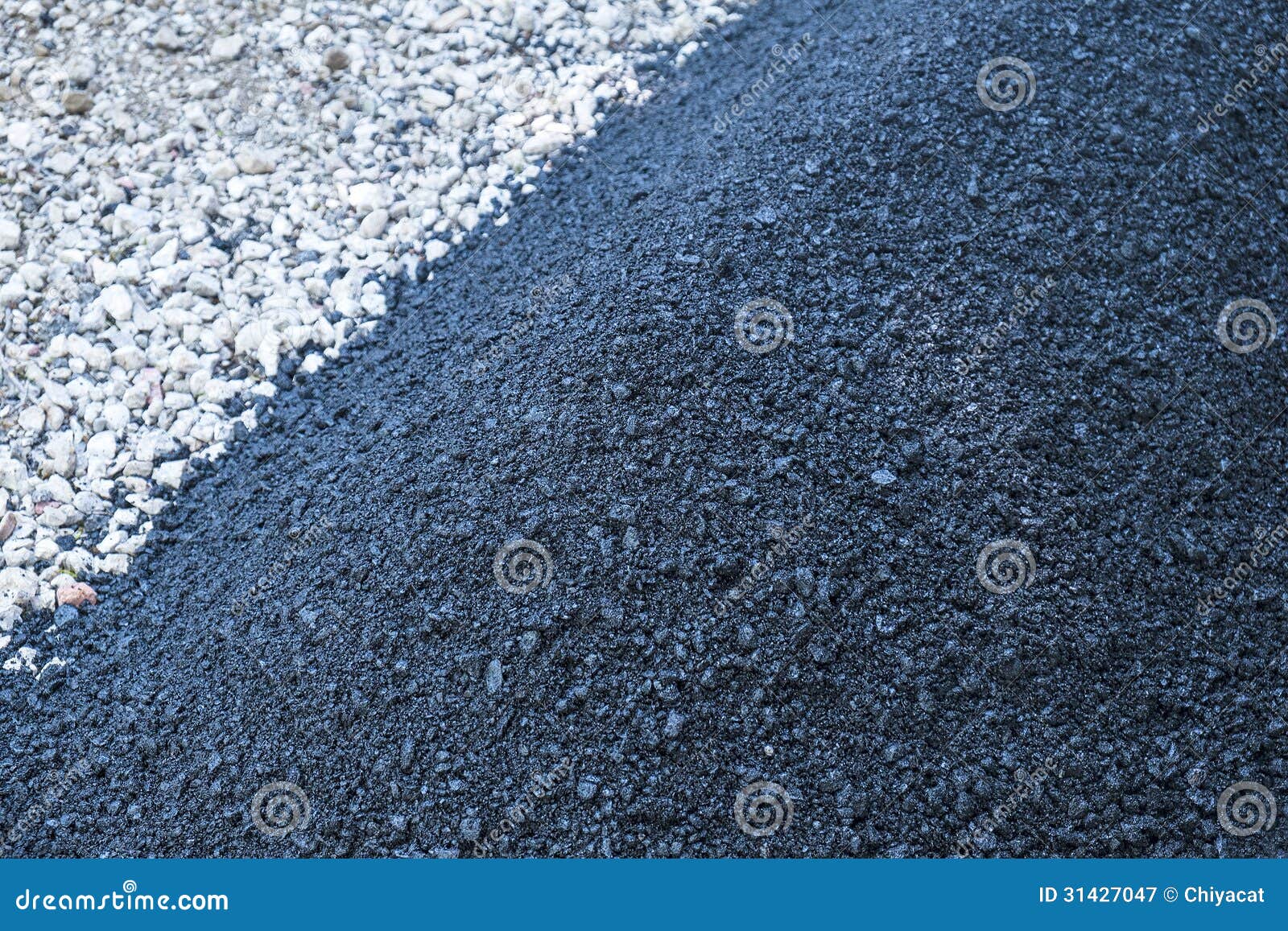 paving a driveway with asphalt
