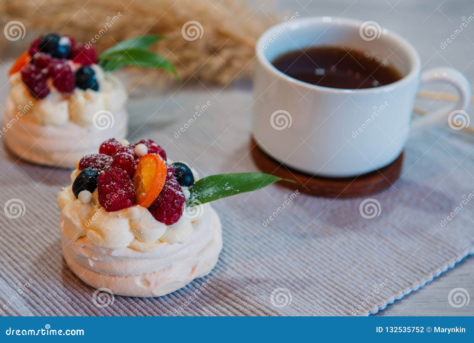 Pavlova Meringue Cake With Cream And Small Fruits Stock ...