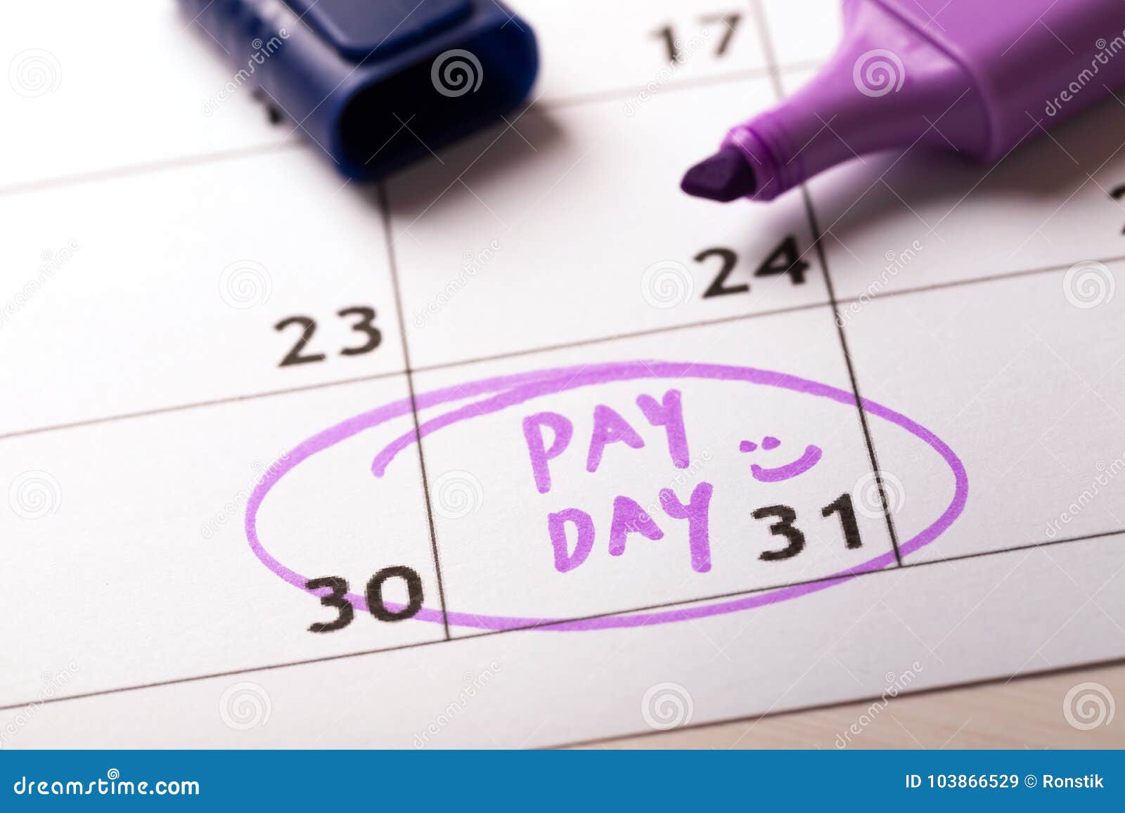 payday concept calendar with marker and circled day of salary