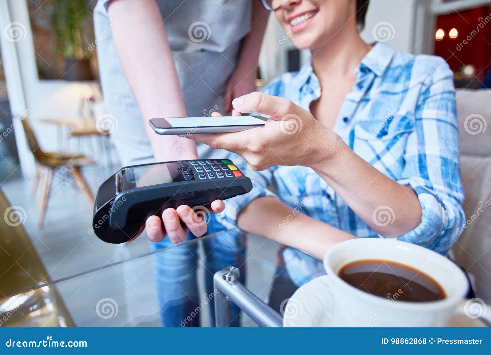 Paying for coffee stock photo. Image of device, checkout 98862868