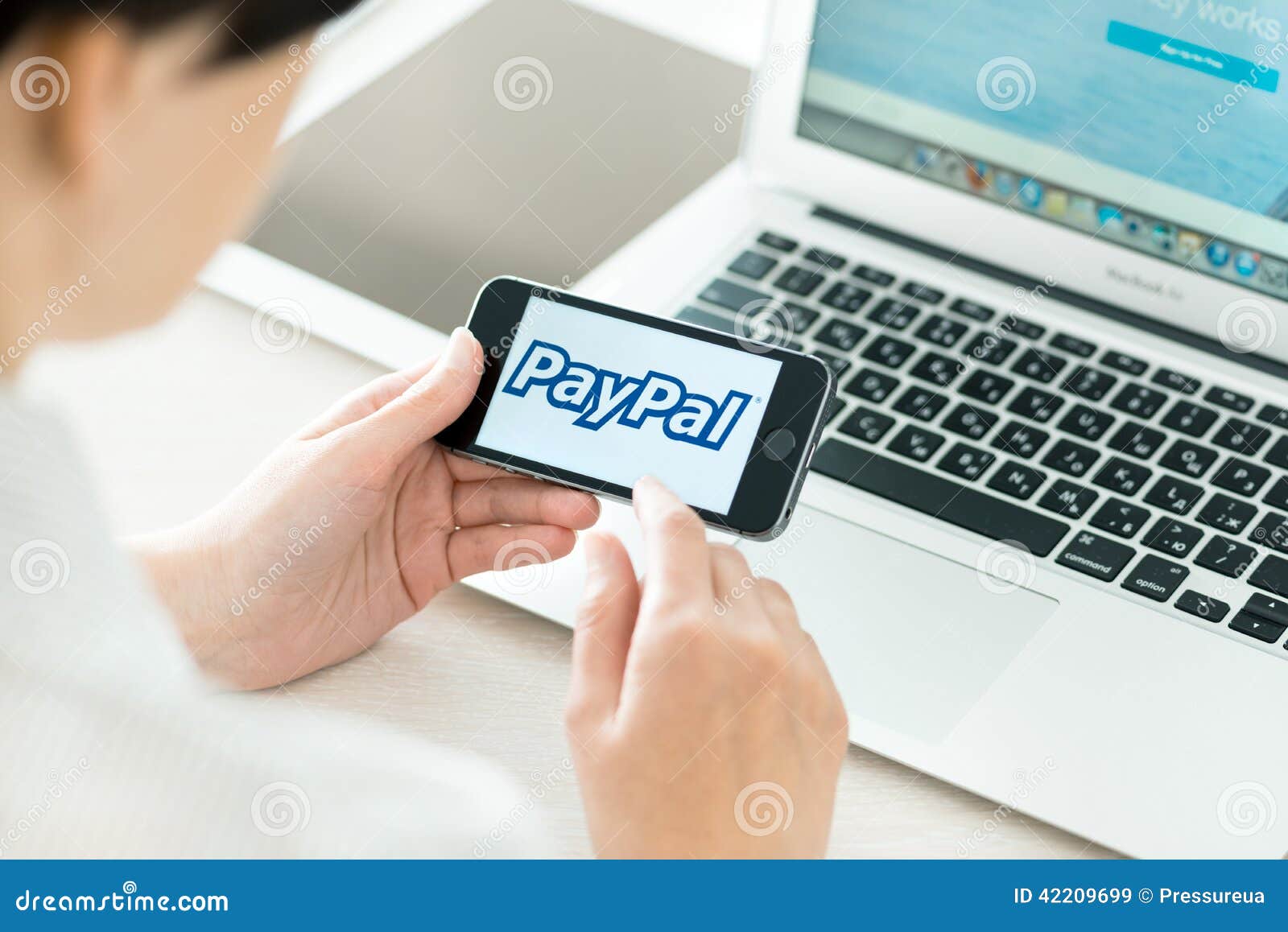 https://thumbs.dreamstime.com/z/paypal-logo-apple-iphone-s-kiev-ukraine-june-person-workplace-holding-hand-brand-new-screen-42209699.jpg