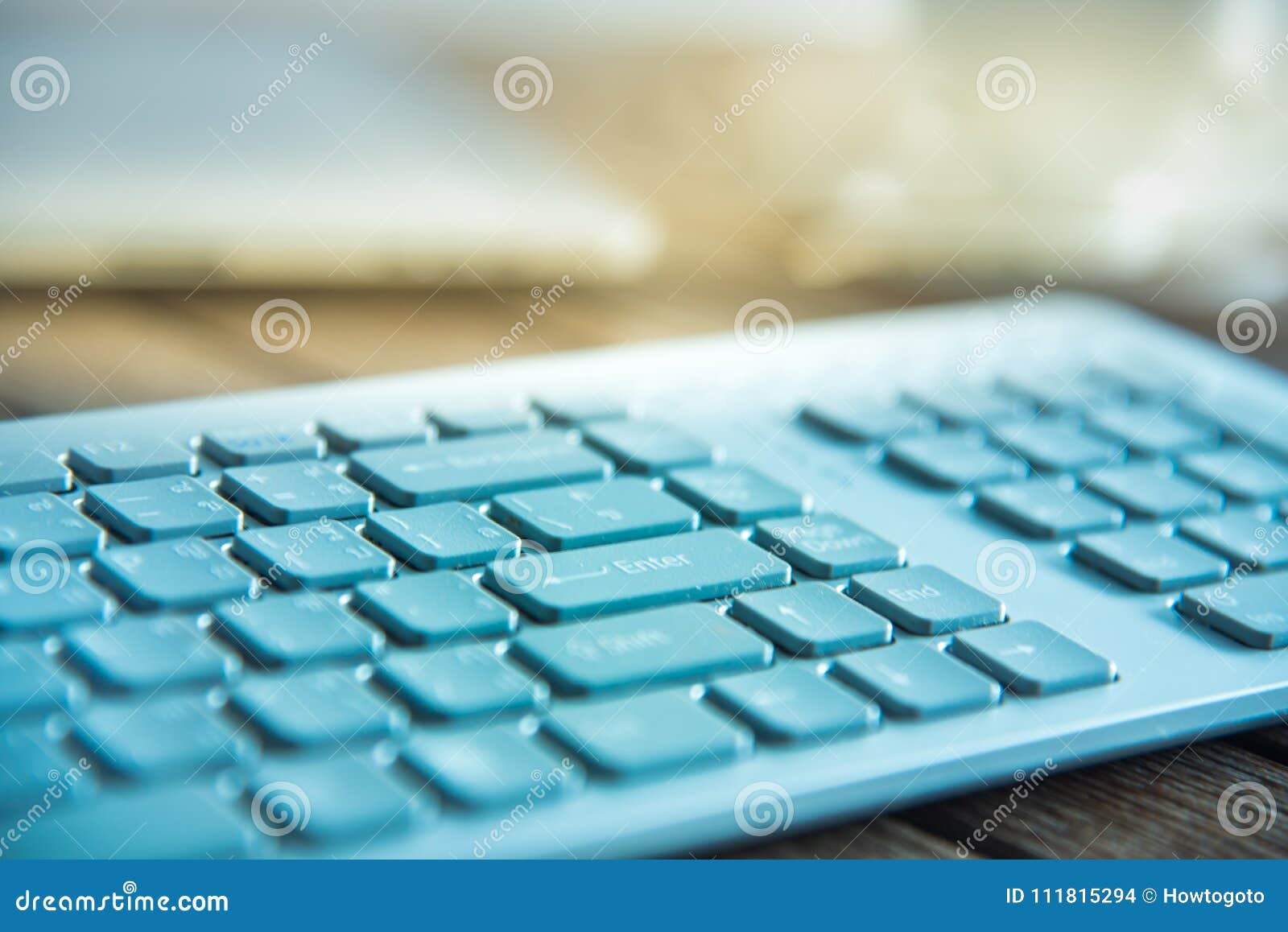 pc keyboard and cup of coffee on old weathering wooden table
