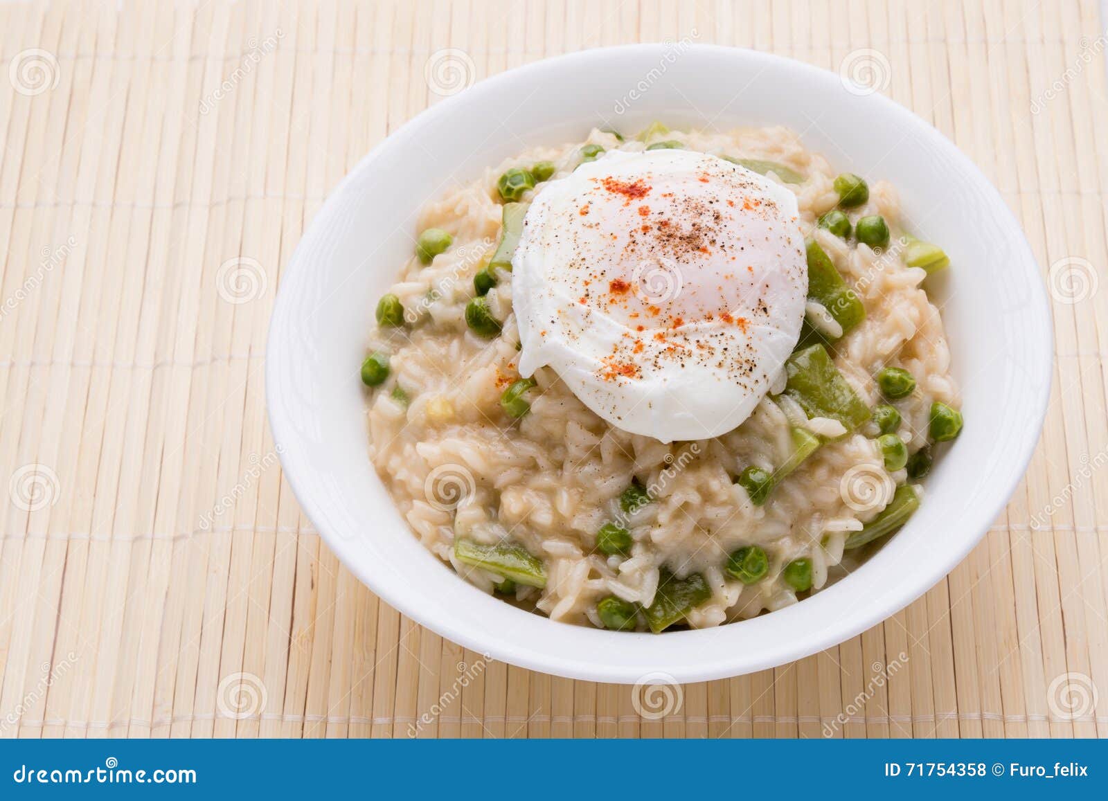 Pea risotto with egg stock photo. Image of rice, plate 71754358