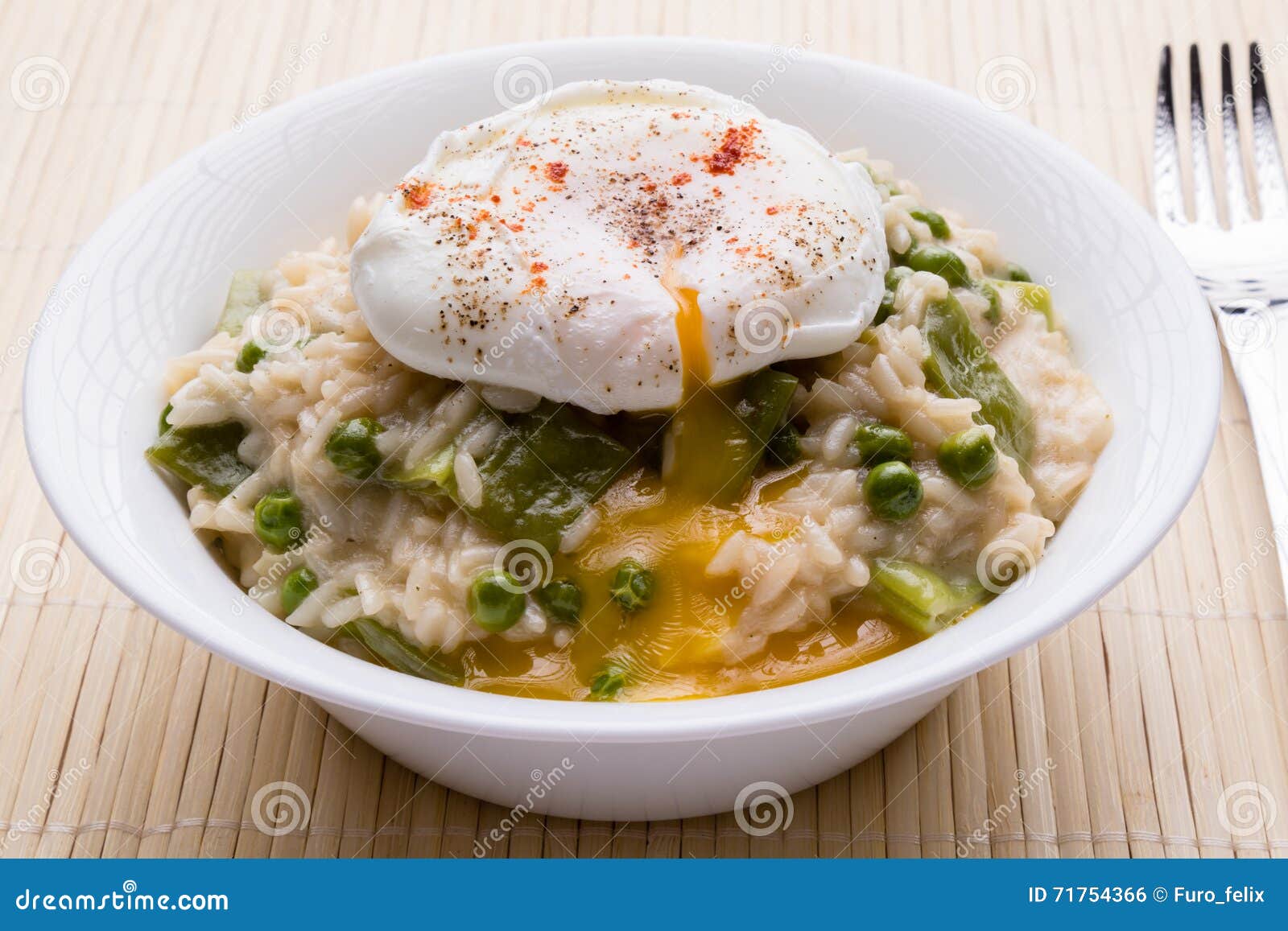 Pea risotto with egg stock photo. Image of bowl, food 71754366
