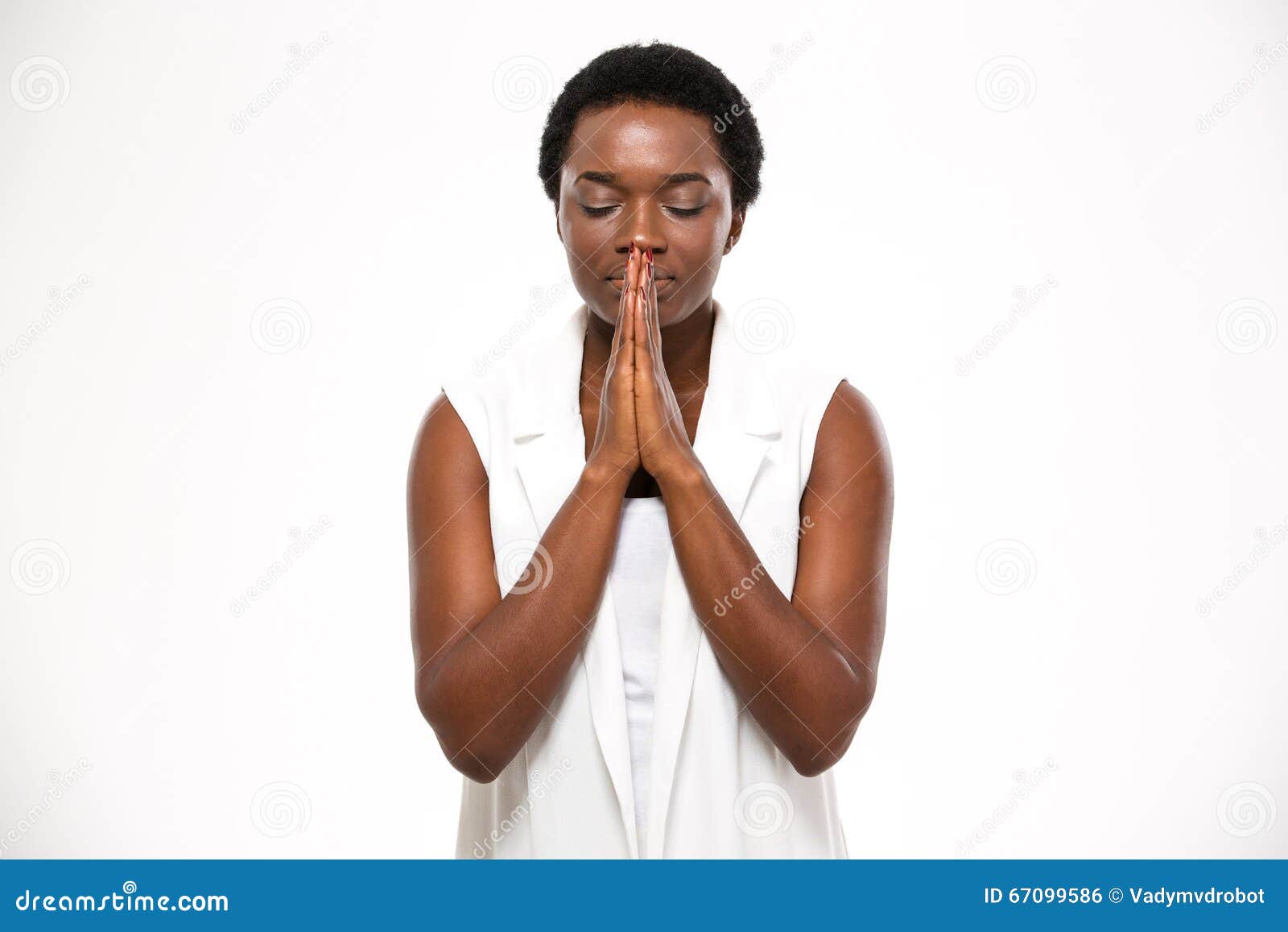 Peaceful Beautiful African American Young Woman Standing And Praying