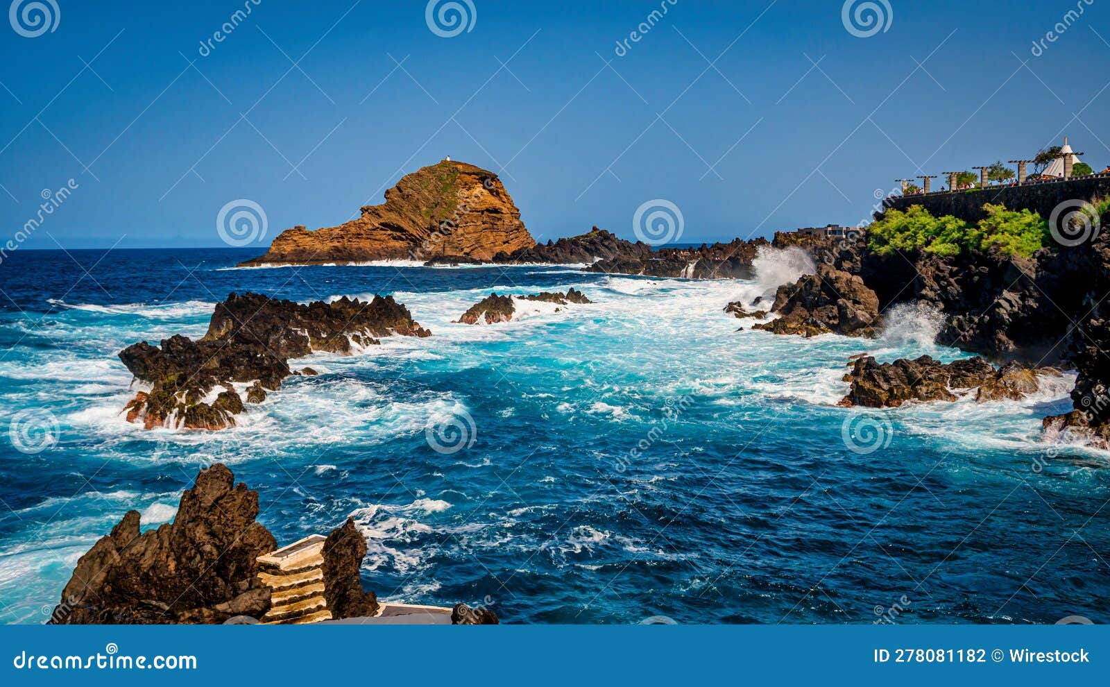 Peaceful Body of Blue Ocean Waters, with a Rugged and Rocky ...
