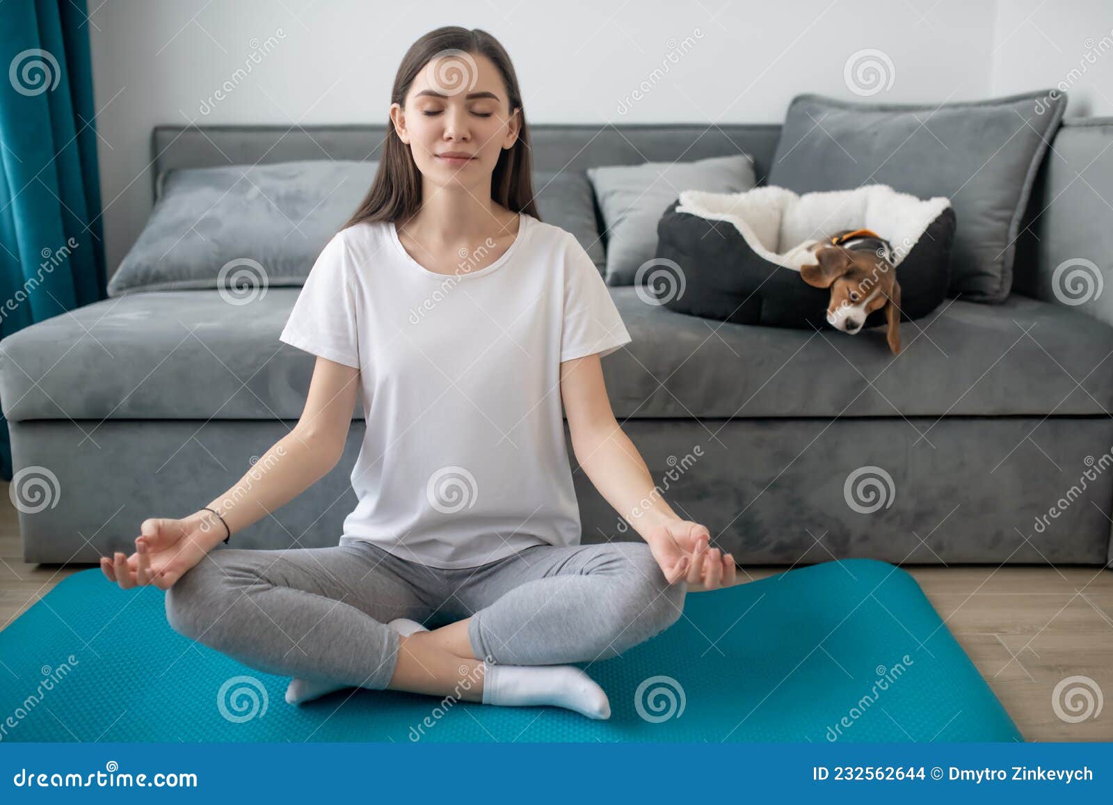 Group of yoga trainers meditating in Savasana position during class with  instructor - a Royalty Free Stock Photo from Photocase