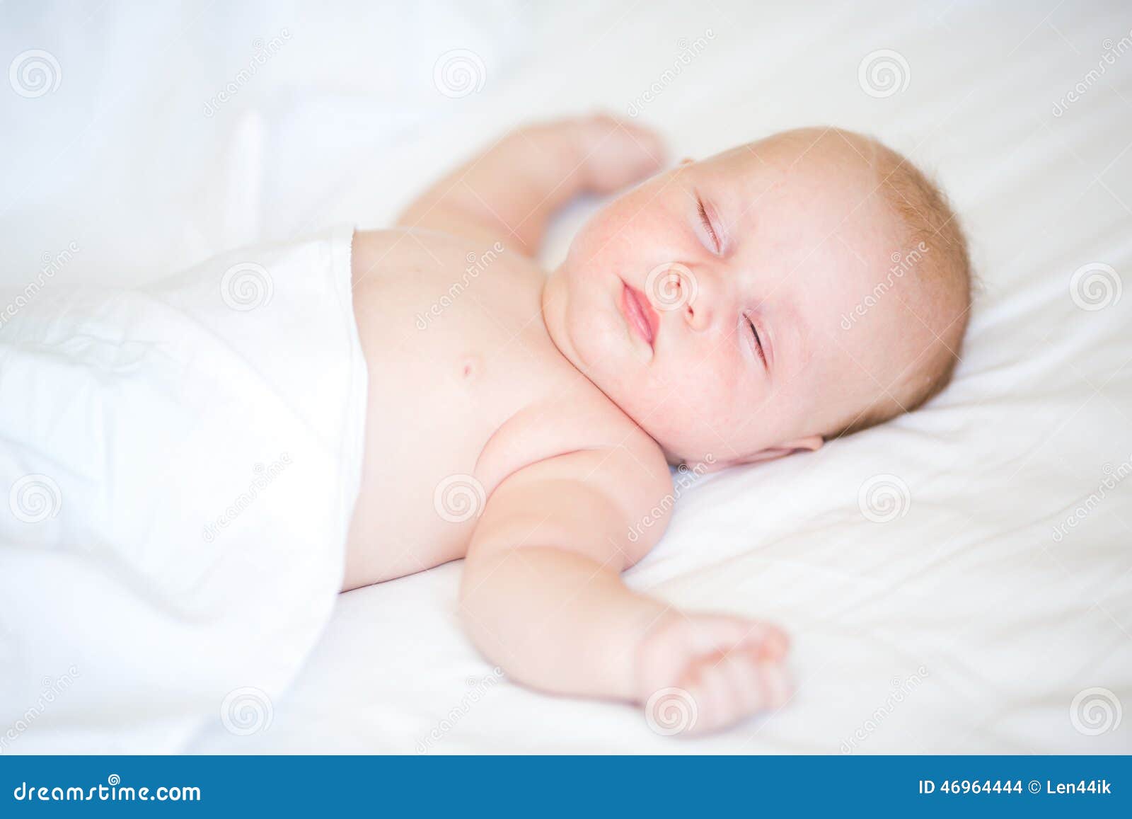 Peaceful Newborn Baby Lying On A Bed Sleeping Stock Photo Image Of