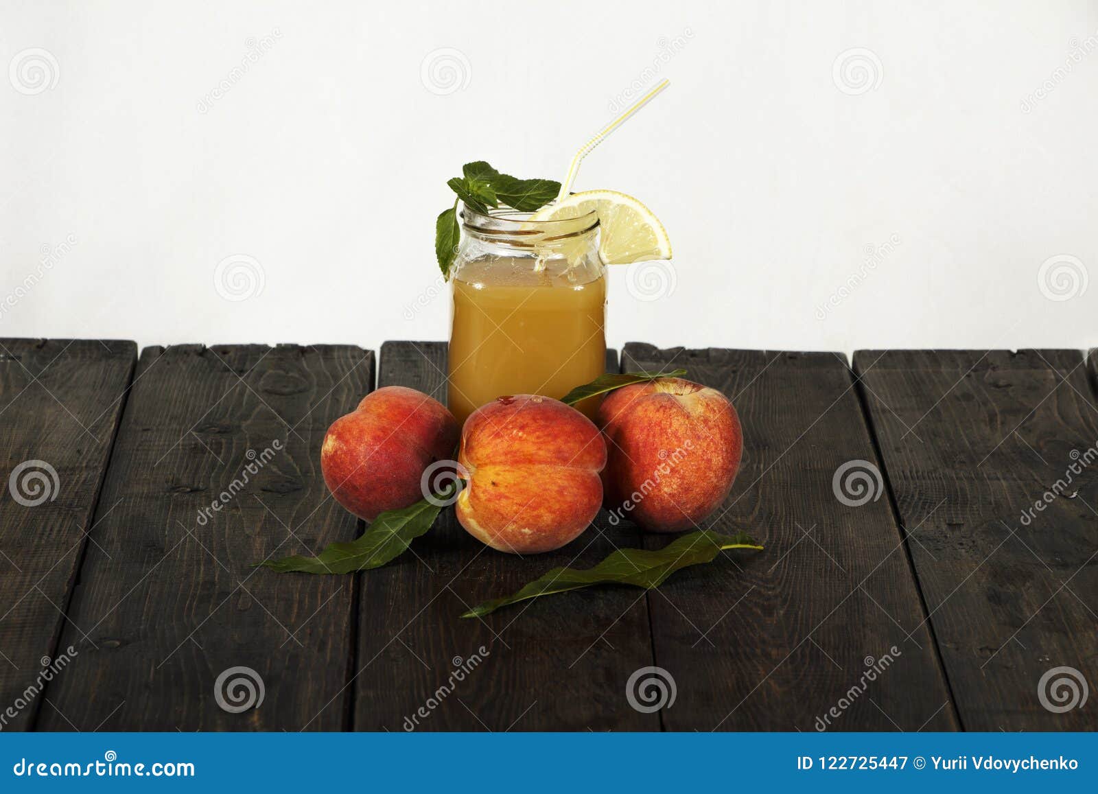 peach fresh juice with fresh peaches on a dark background. top view, copy space. healthy eating. fresh juice with peach.