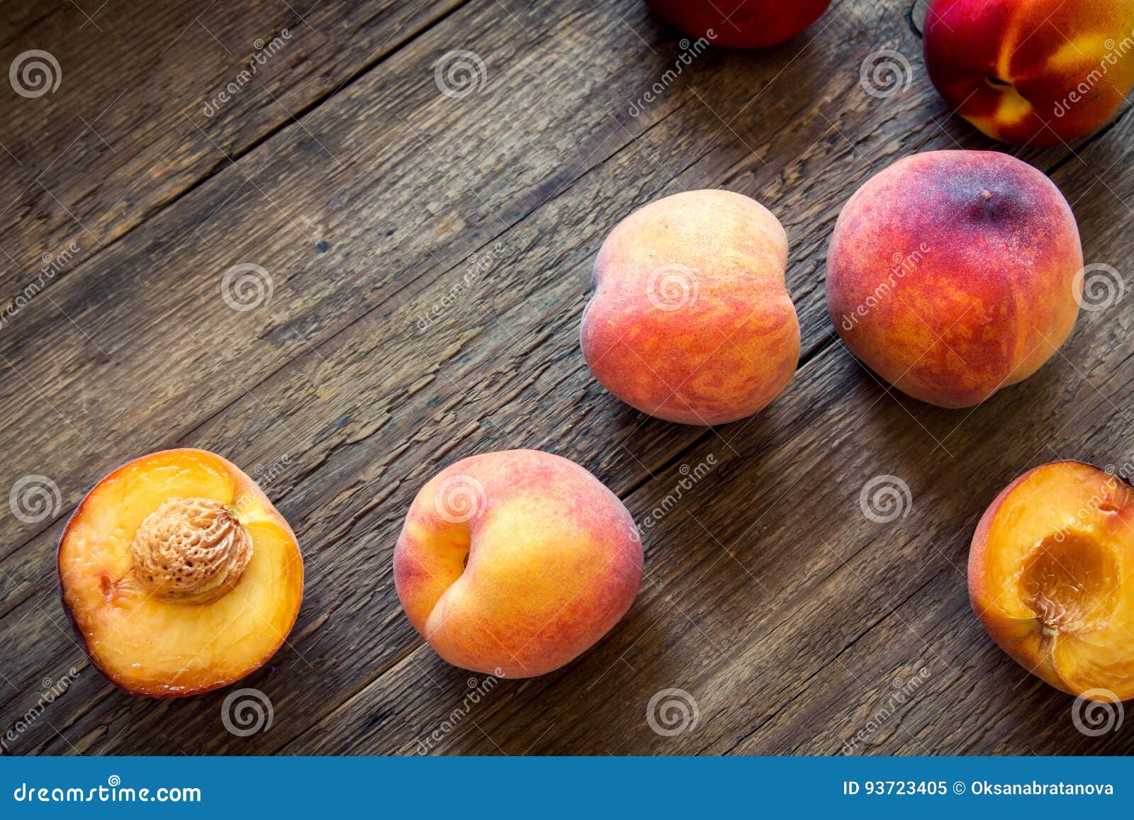 Fresh Organic Peaches on rustic wooden background with copy space. Sweet summer peaches.