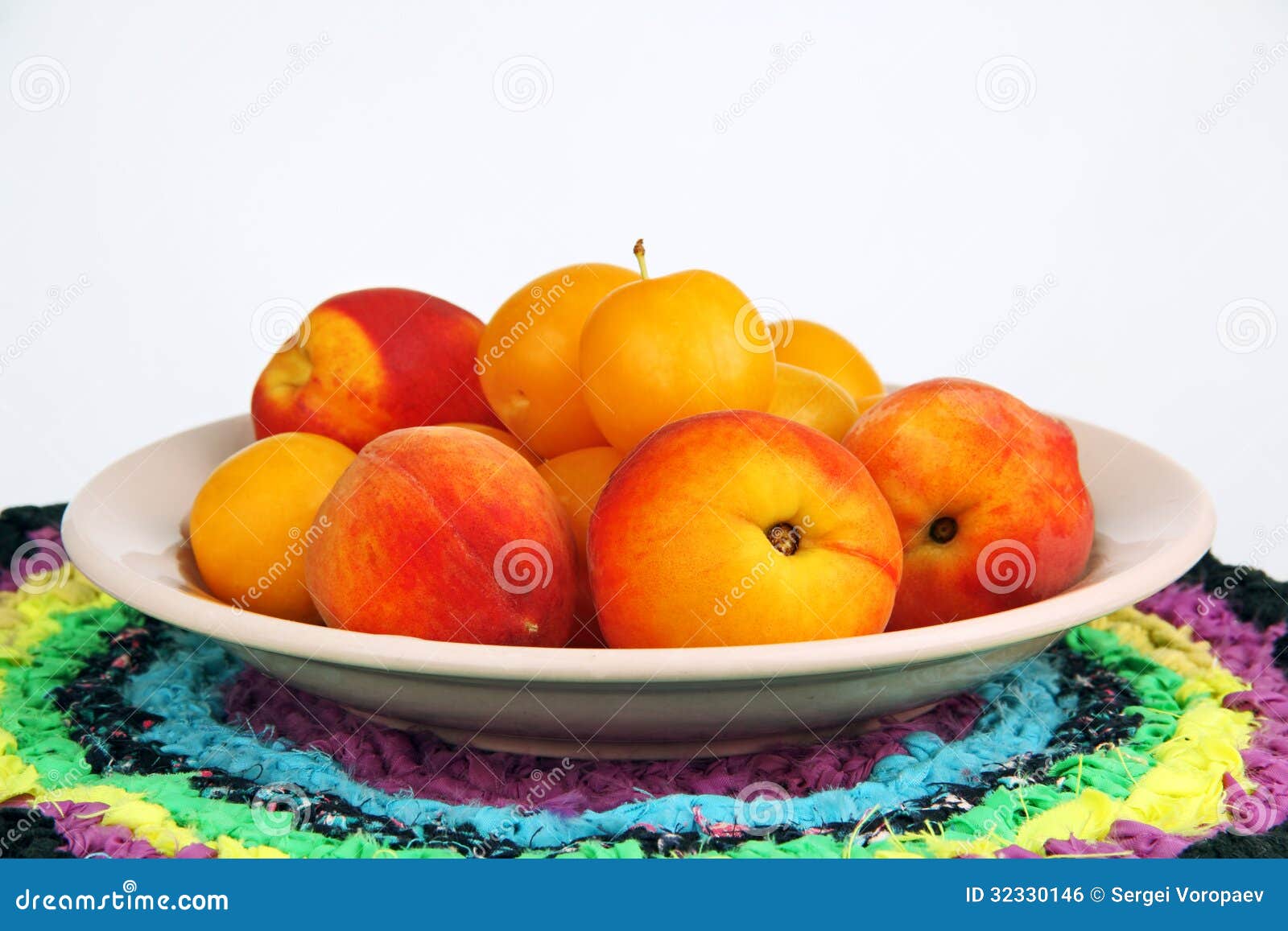 Peaches and Plums in a Bowl. Stock Photo Image of bowl, plate 32330146