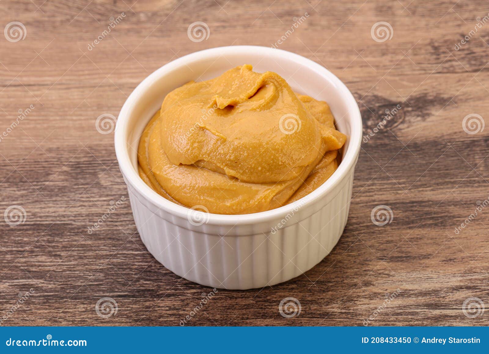 Peanut butter in the bowl stock photo. Image of food 208433450