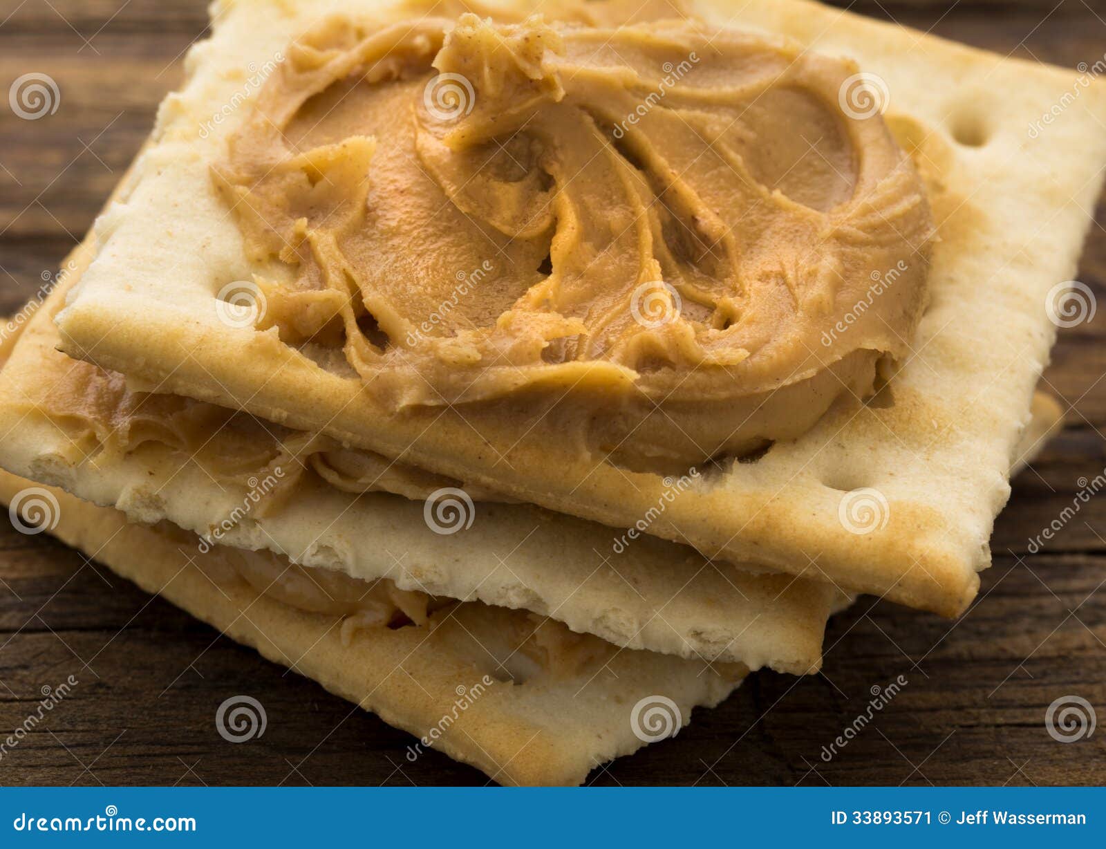 Peanut Butter on Crackers stock image. Image of swirl 33893571
