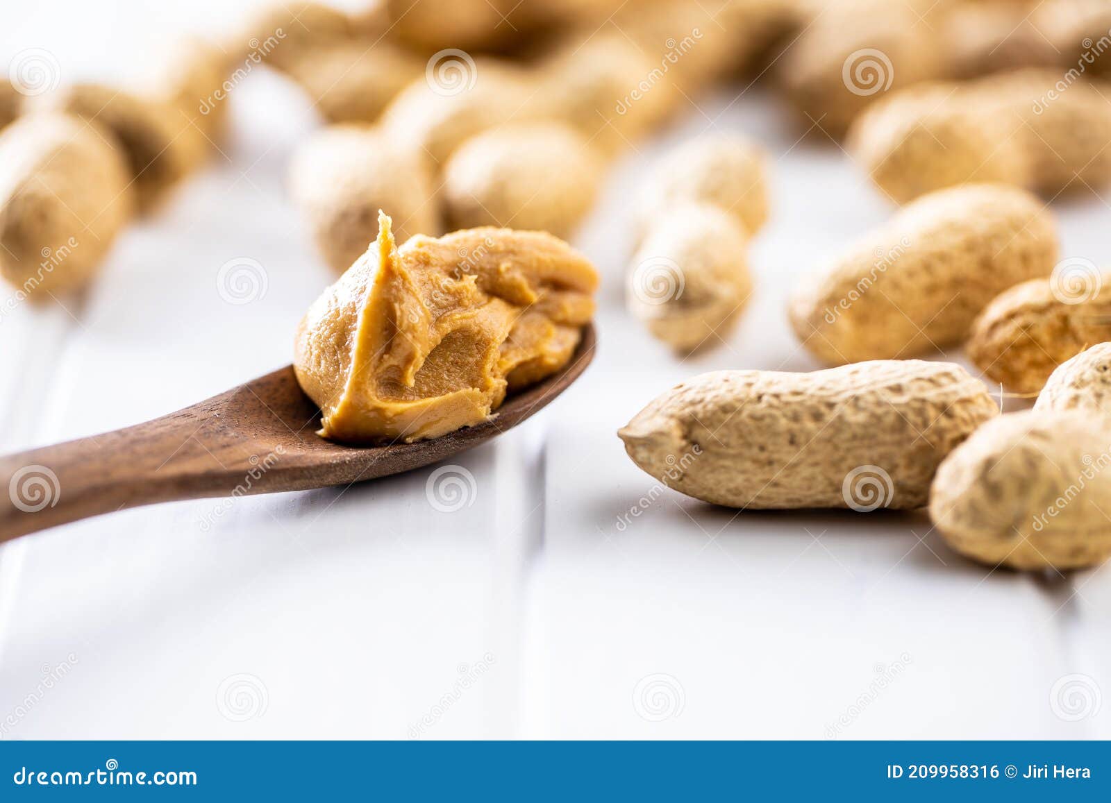 Peanut Butter in Wooden Spoon and Peanuts Stock Photo Image of
