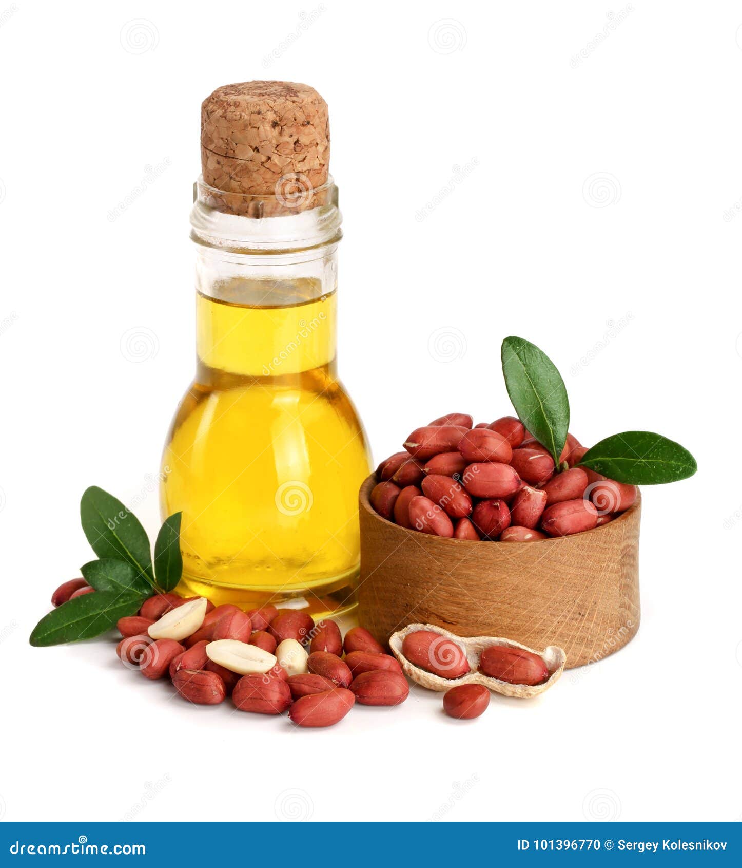 Peanut Oil in a Glass Bottle with Peanuts in Bowl Stock Photo Image