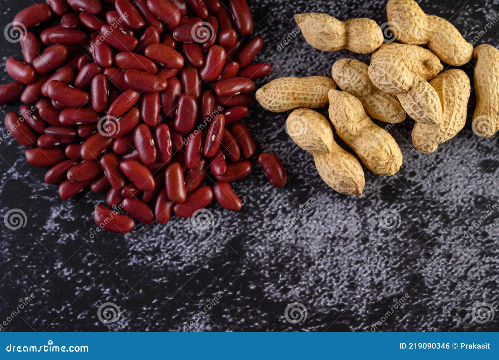 Peanut and Red Beans on a Black Cement Floor Background Stock Photo